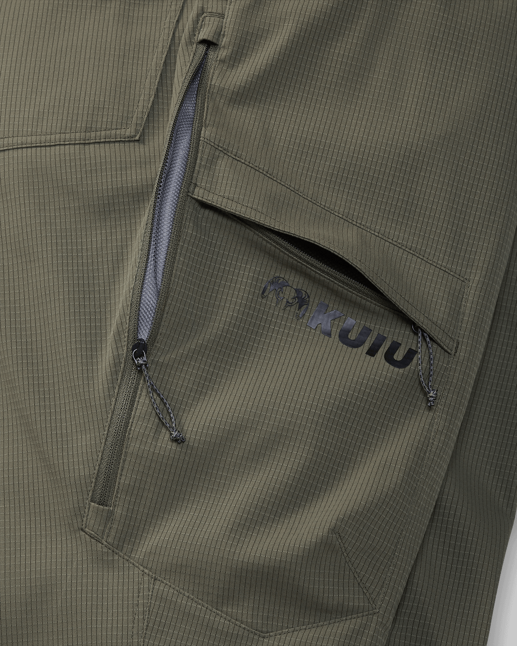 Detail of partially open hip vent and open cargo pocket on Women's Tiburon Pant in Ash Brown