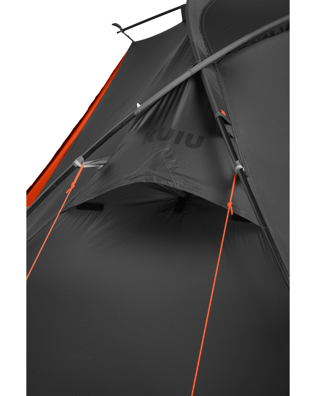 Detailed tent exterior of rain fly and tent body connected together with two guy lines wrapped on tent poles