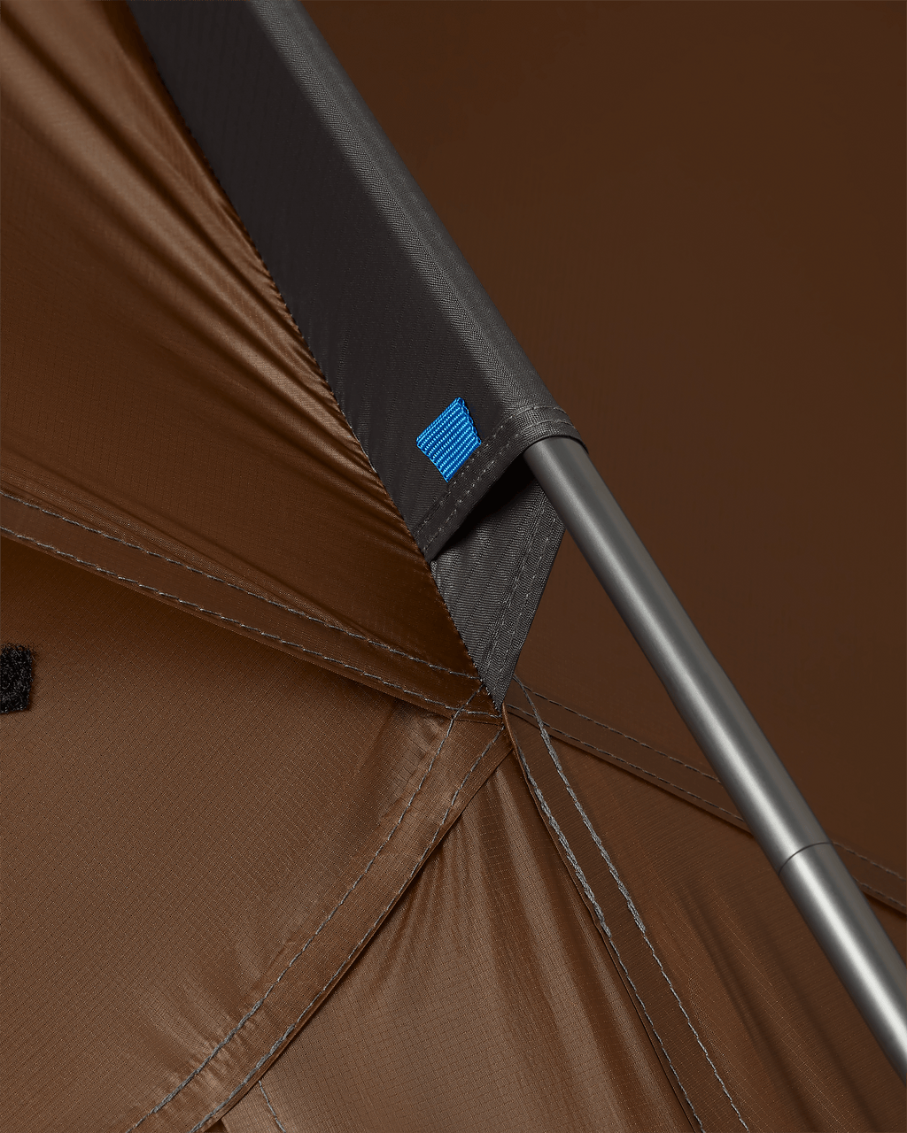 tent pole secured in color coded tent pole sleeve on Mountain Star 3 Person Tent in Gunmetal Grey, Camel Brown