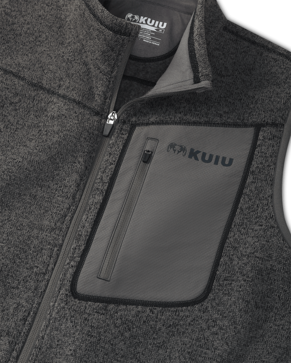 Flat lay highlighting front zipper, tagless KUIU label, and vertical left chest pocket on Base Camp Sweater Vest in Charcoal Heather Grey