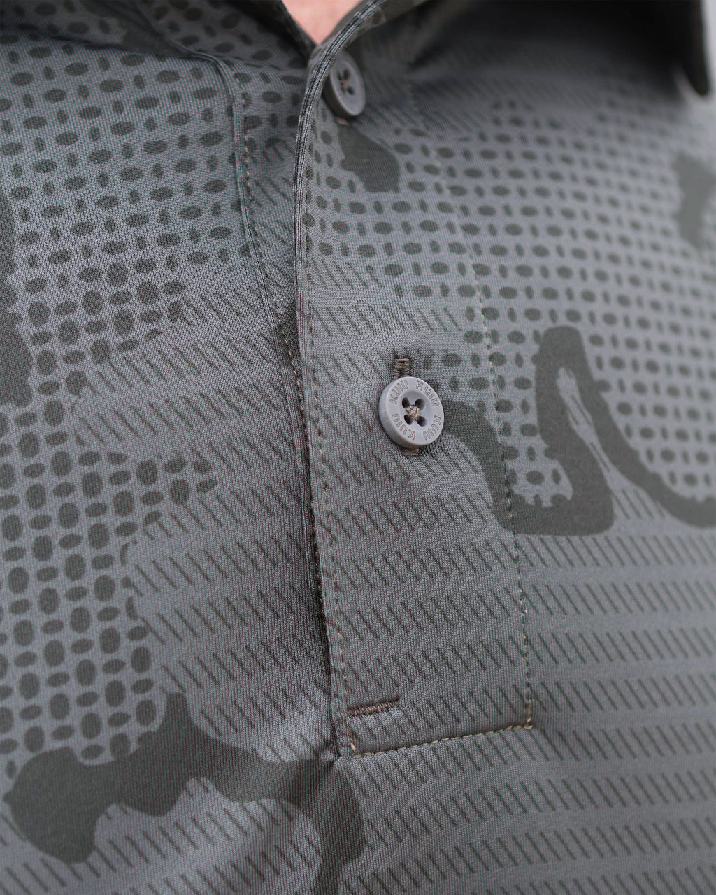 Close-up view of outer placket and buttons on KUIU Performance Polo T-Shirt Gunmetal Grey Tonal Print