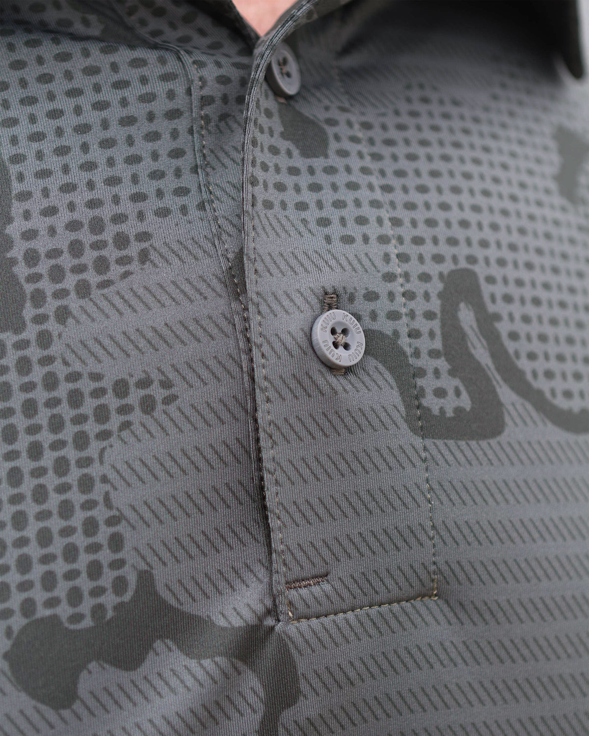 Close-up view of outer placket and buttons on KUIU Performance Polo T-Shirt Gunmetal Grey Tonal Print