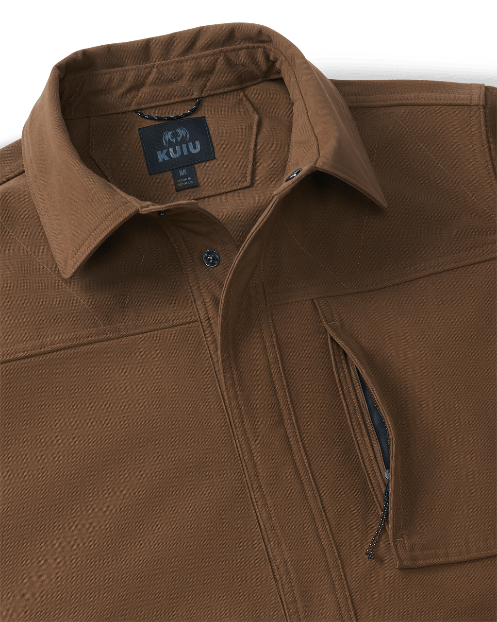 Close-up view highlighting neck collar, snap button and vertical zippered left chest pocket on Brawley Canvas Jacket in Saddle Brown