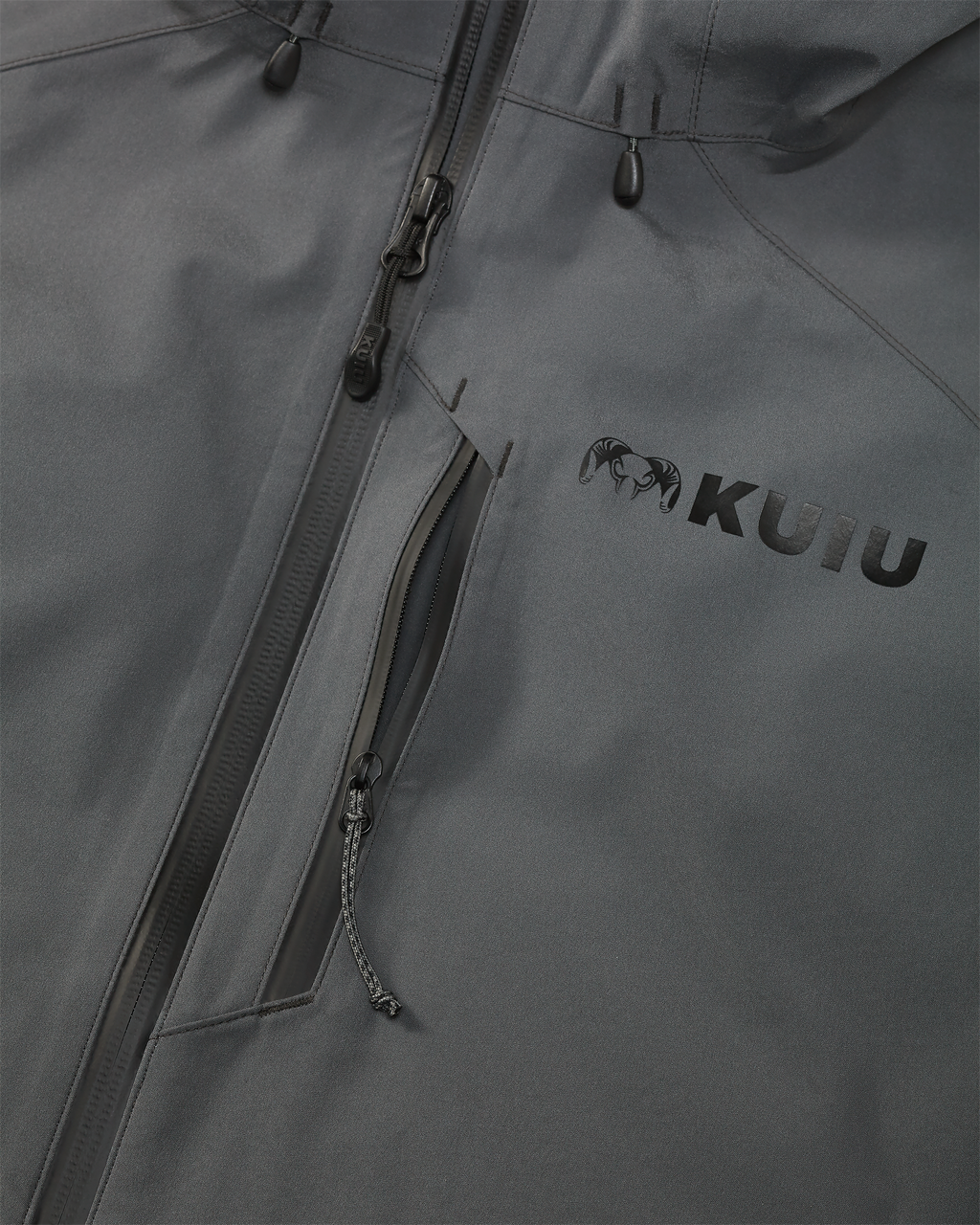 Close-up detail of front zipper and vertical zippered chest pocket on the Northridge Rain Jacket in Gunmetal Grey