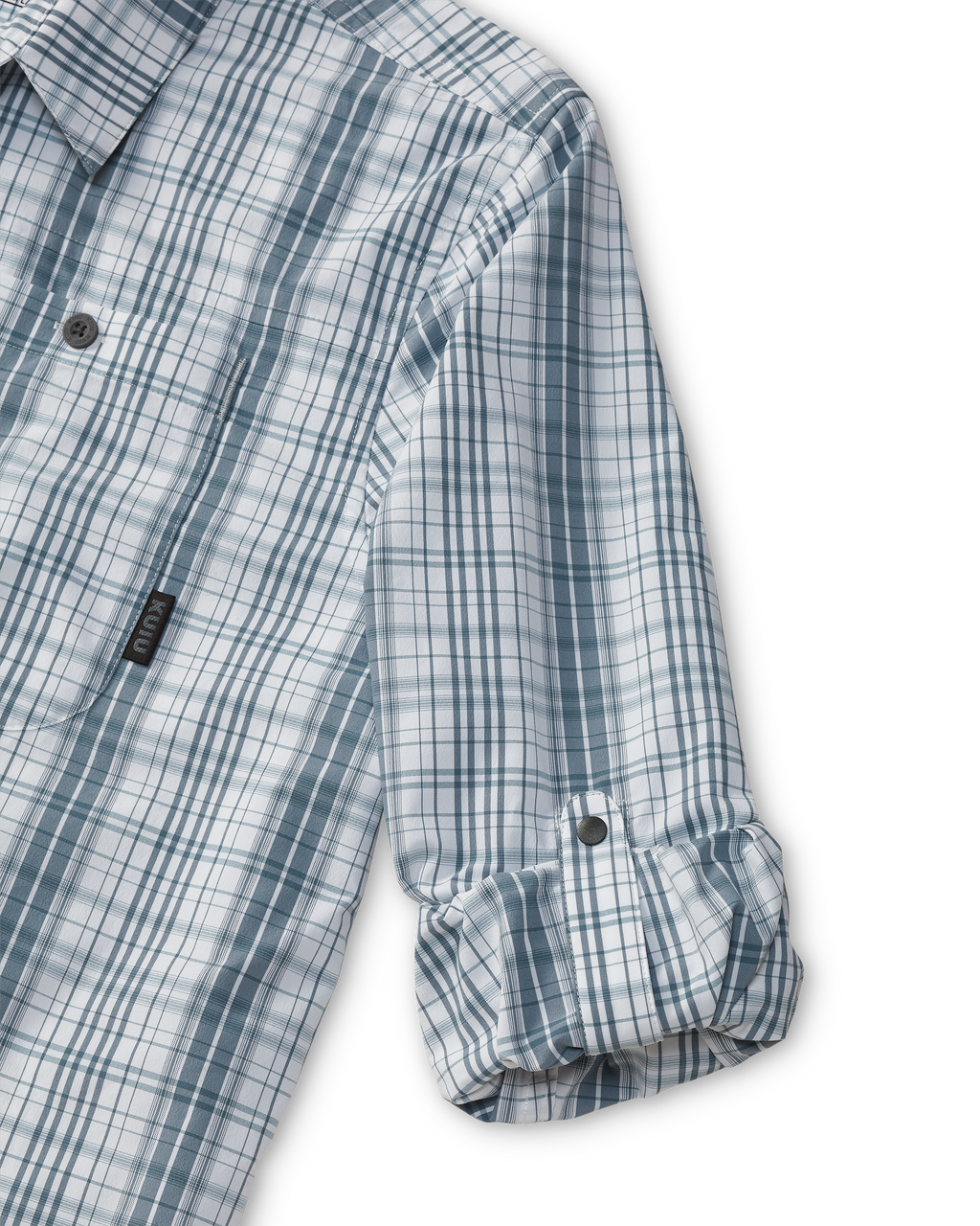 Close-up of Borrego LS Shirt in Blueish Grey Gravel Plaid, Highlighting rolled-up sleeve with button cuff retention strap
