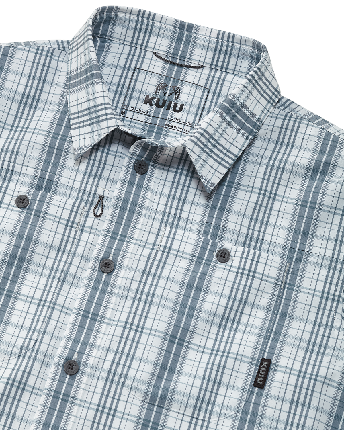 Close-up of shirt collar and front button pockets on the Borrego LS Shirt in Blueish Grey Gravel Plaid