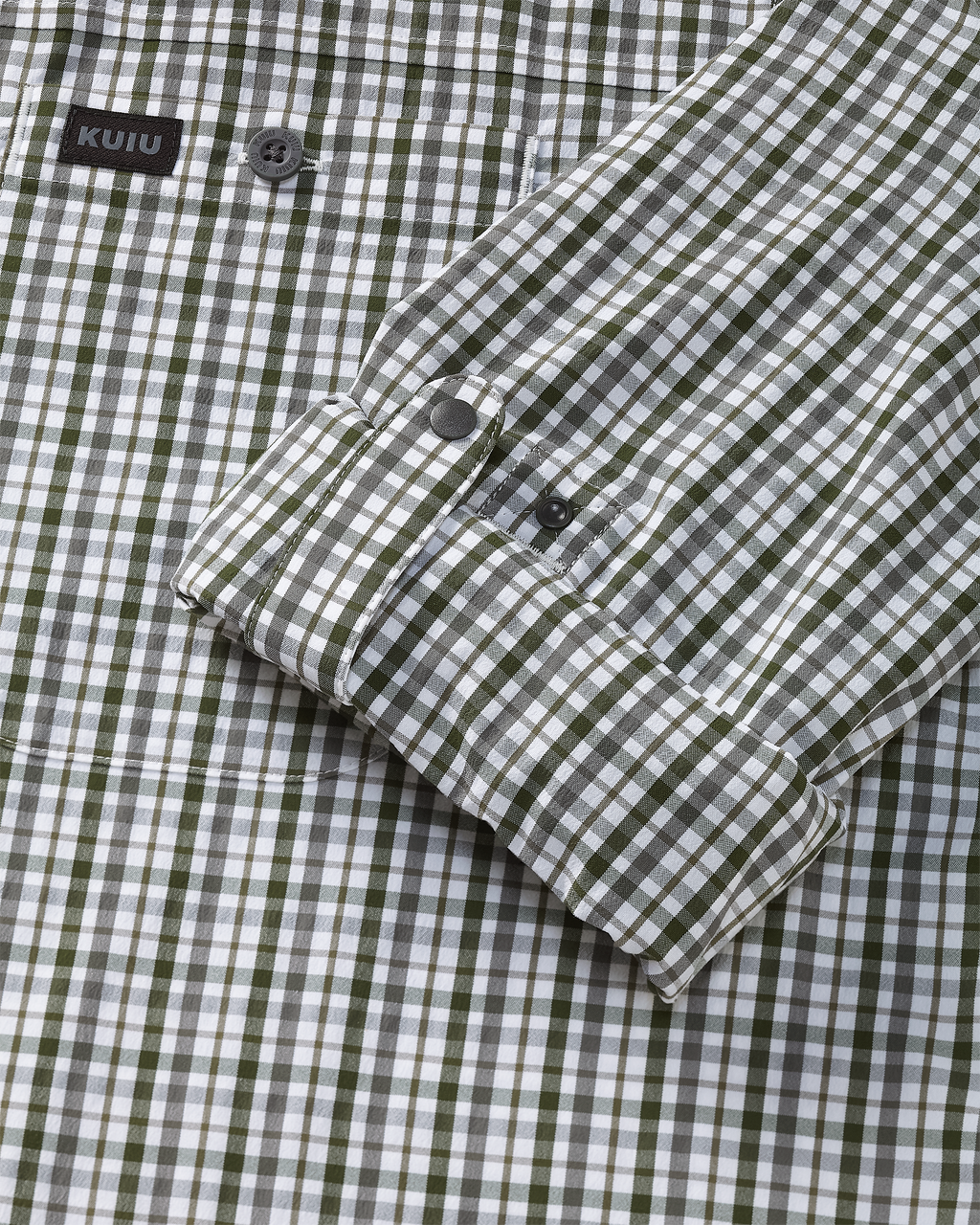 Close-up of Borrego LS Shirt in Mini Cross Check Verde Plaid, Highlighting rolled-up sleeve with button cuff retention strap