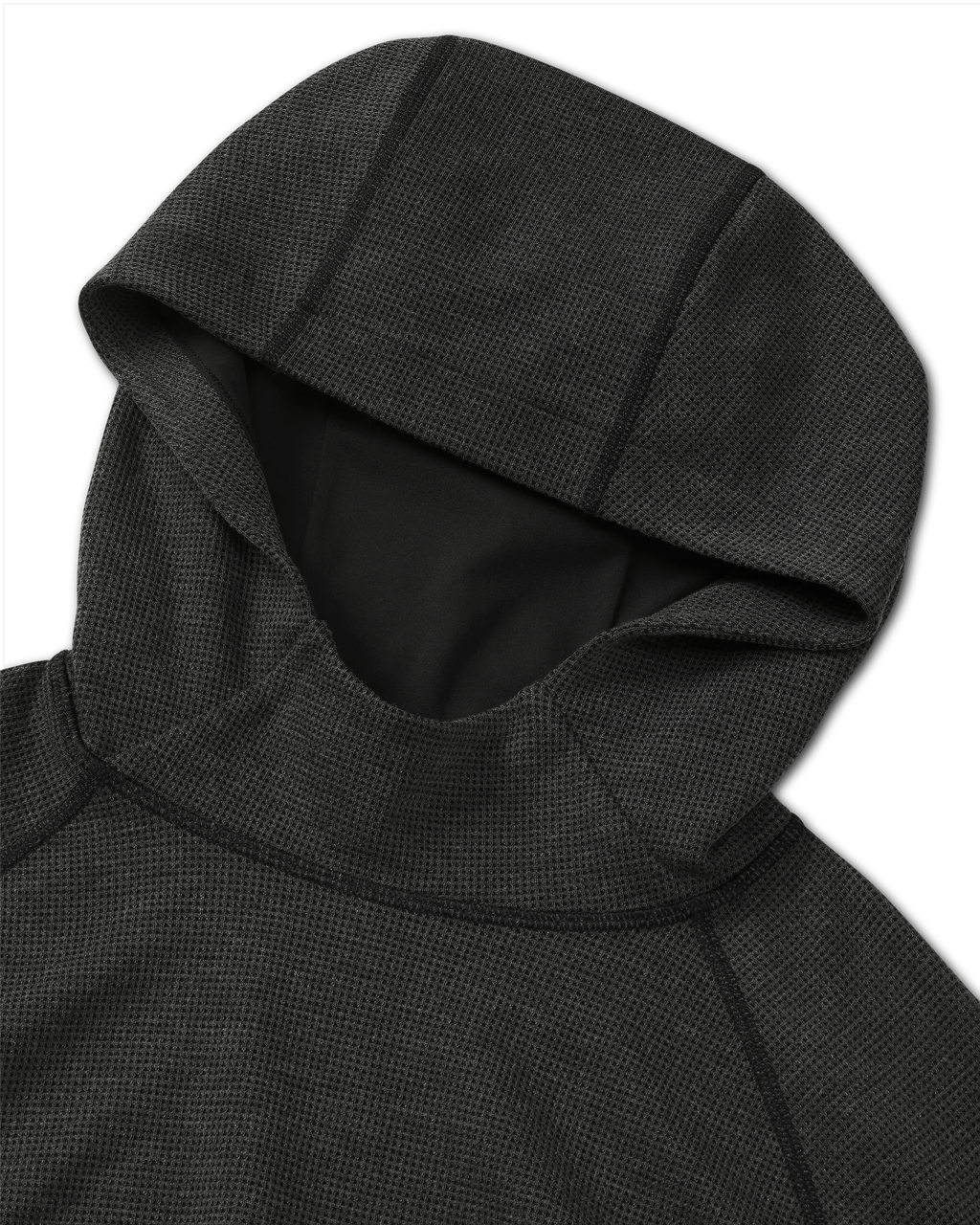 Close-up flat lay view of hood and flatlock seams on the Canyon Waffle Hoodie in Black Heather