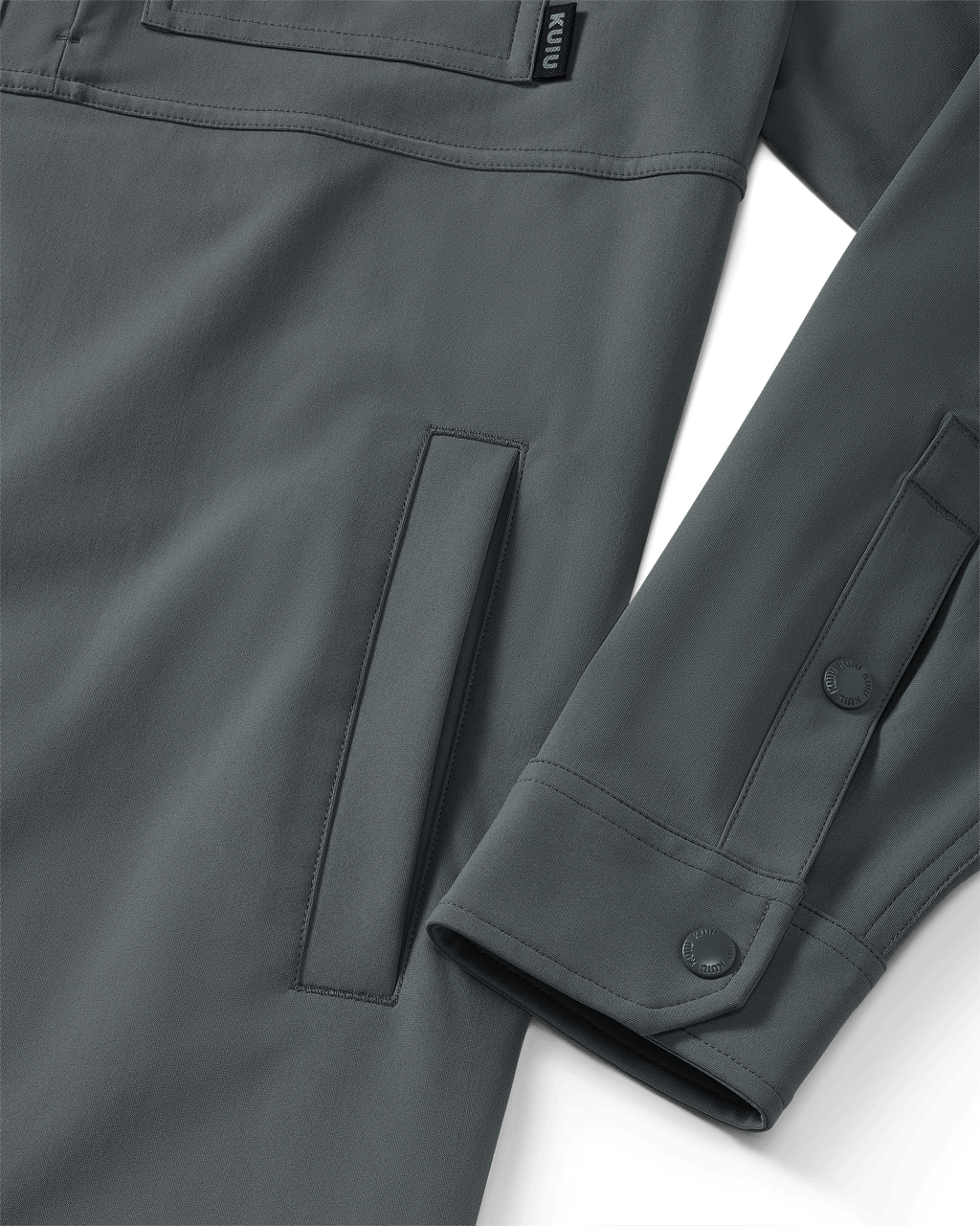 Close-up of hand pocket and snap closure on sleeve and cuff on Tour Shirt Jacket in Castle Rock Grey