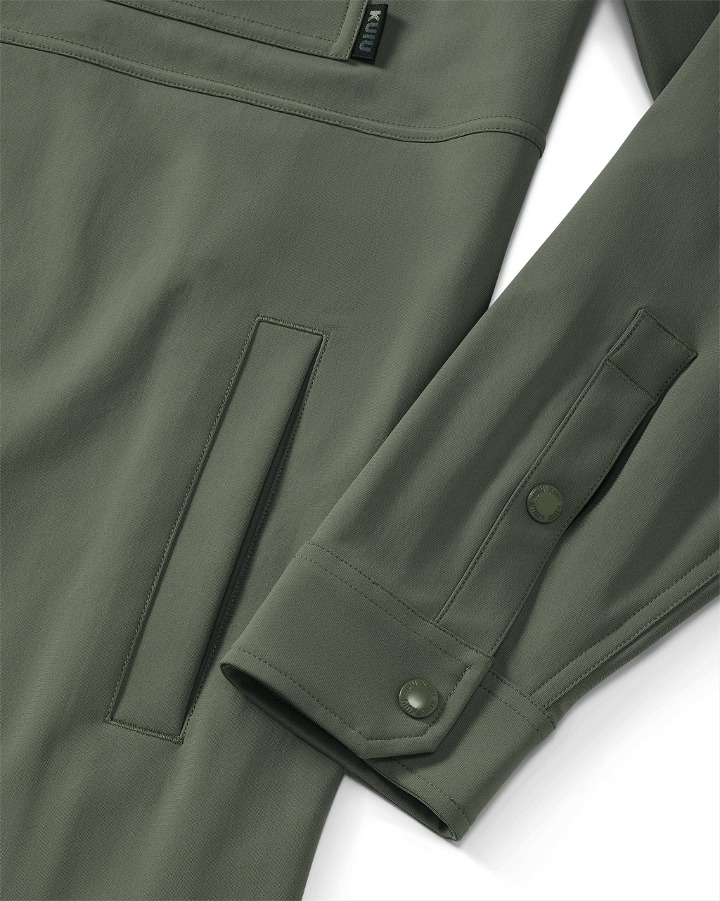 Close-up of hand pocket and snap closure on sleeve and cuff on Tour Shirt Jacket in Dark Sage