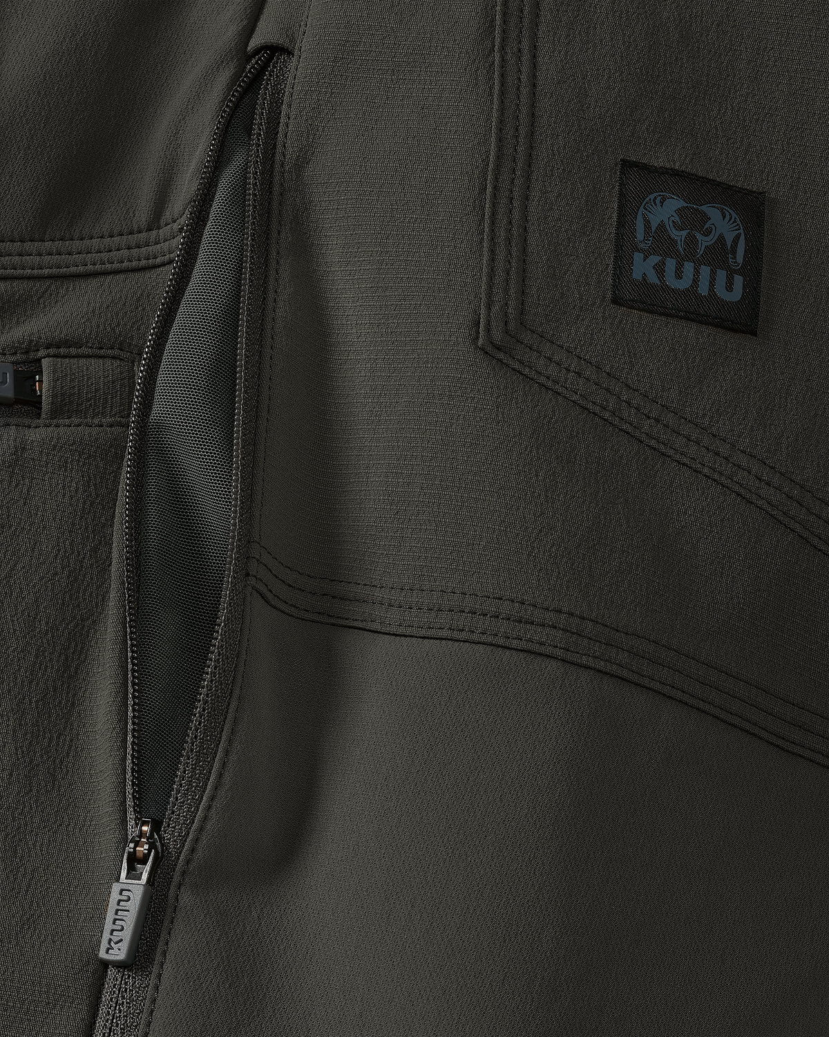 Close-up of hip-zips with lightweight mesh lining for ventilation on the Groundwork Stretch Woven Pant in Asphalt Grey