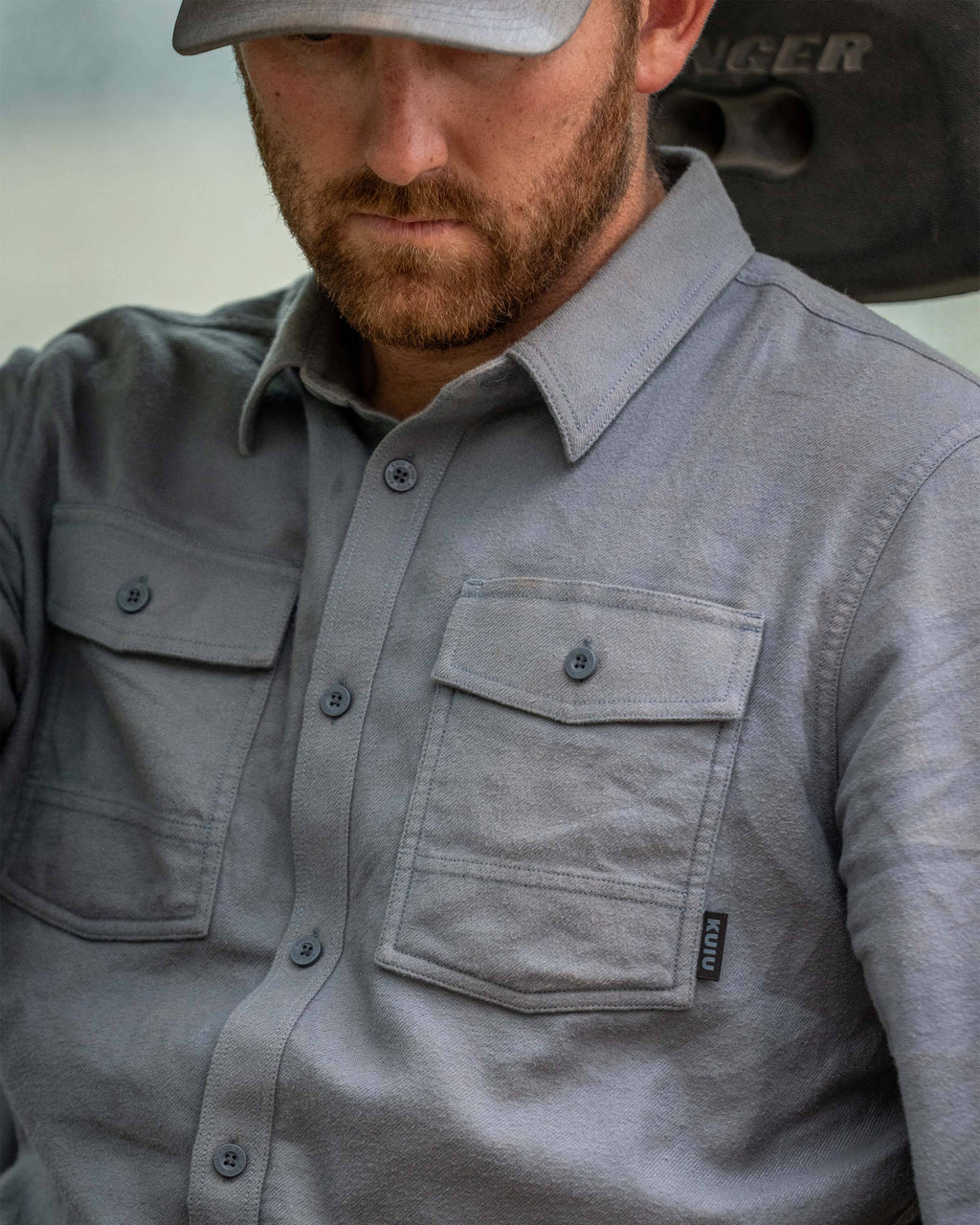 Close-up of man wearing Field Flannel Shirt in Baltic Grey, Highlighting front chest pockets