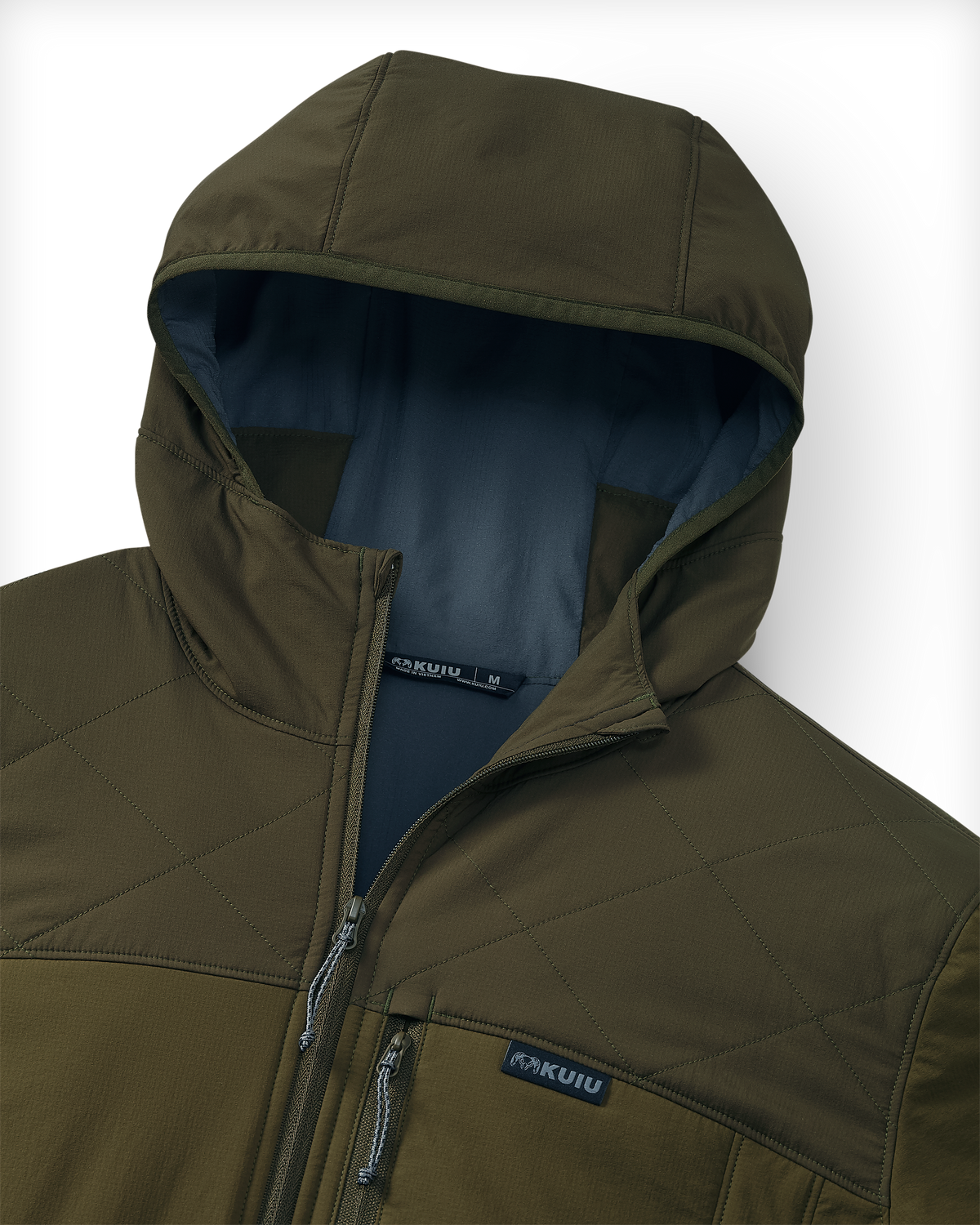 Close-up of the hood on a Transit Packable Jacket in Dark Army/Army, showing the quilted chest panel, zipper, and KUIU sewn-in label.