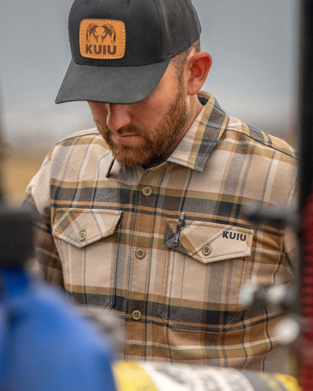 Close-up of Man wearing Flannel Heavyweight Shirt in Valo Check Plaid, Highlighting front chest pockets