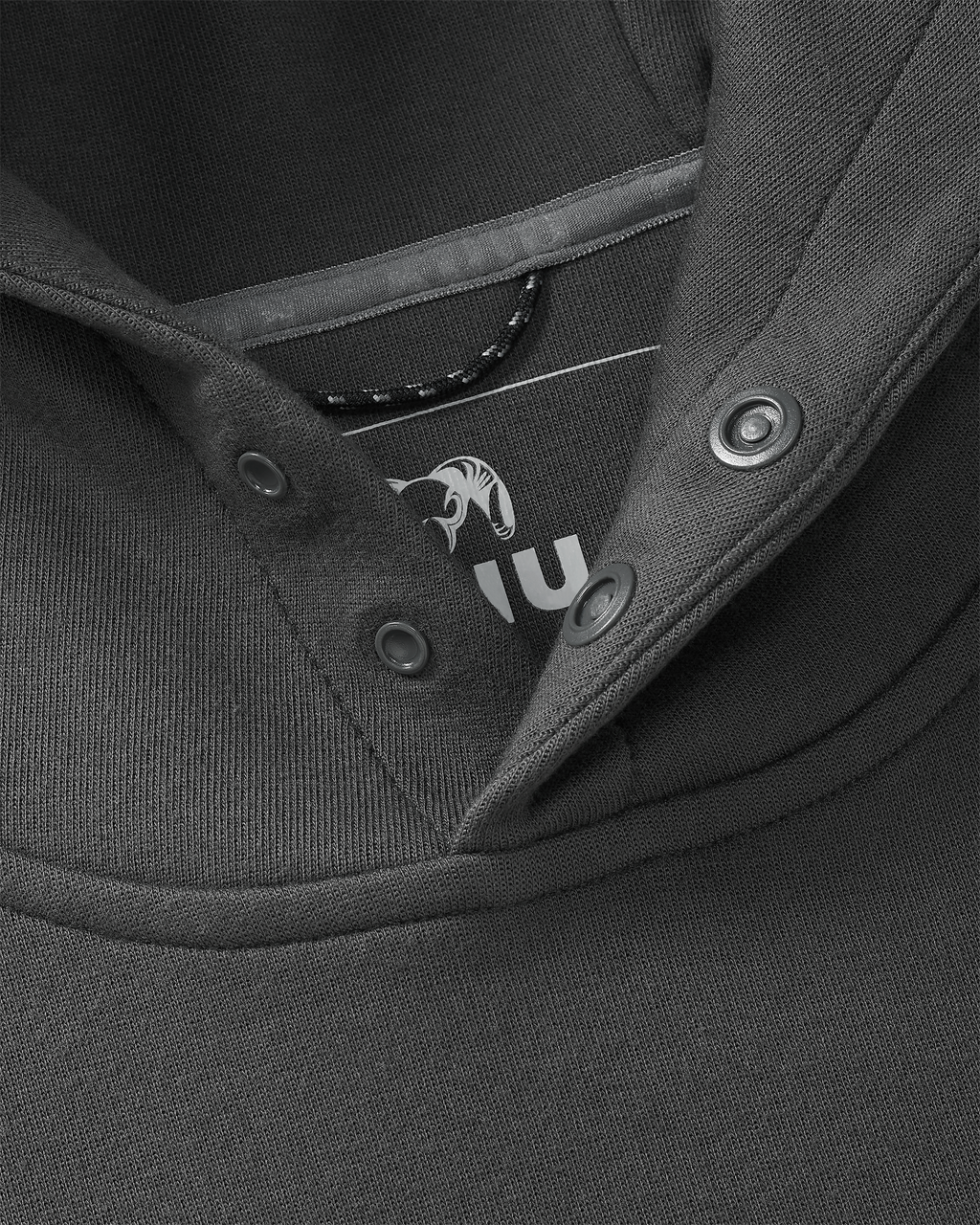 Detail of front snap-fit buttons, free of drawcords, on the Workgrade Utility Hoodie in Asphalt Grey
