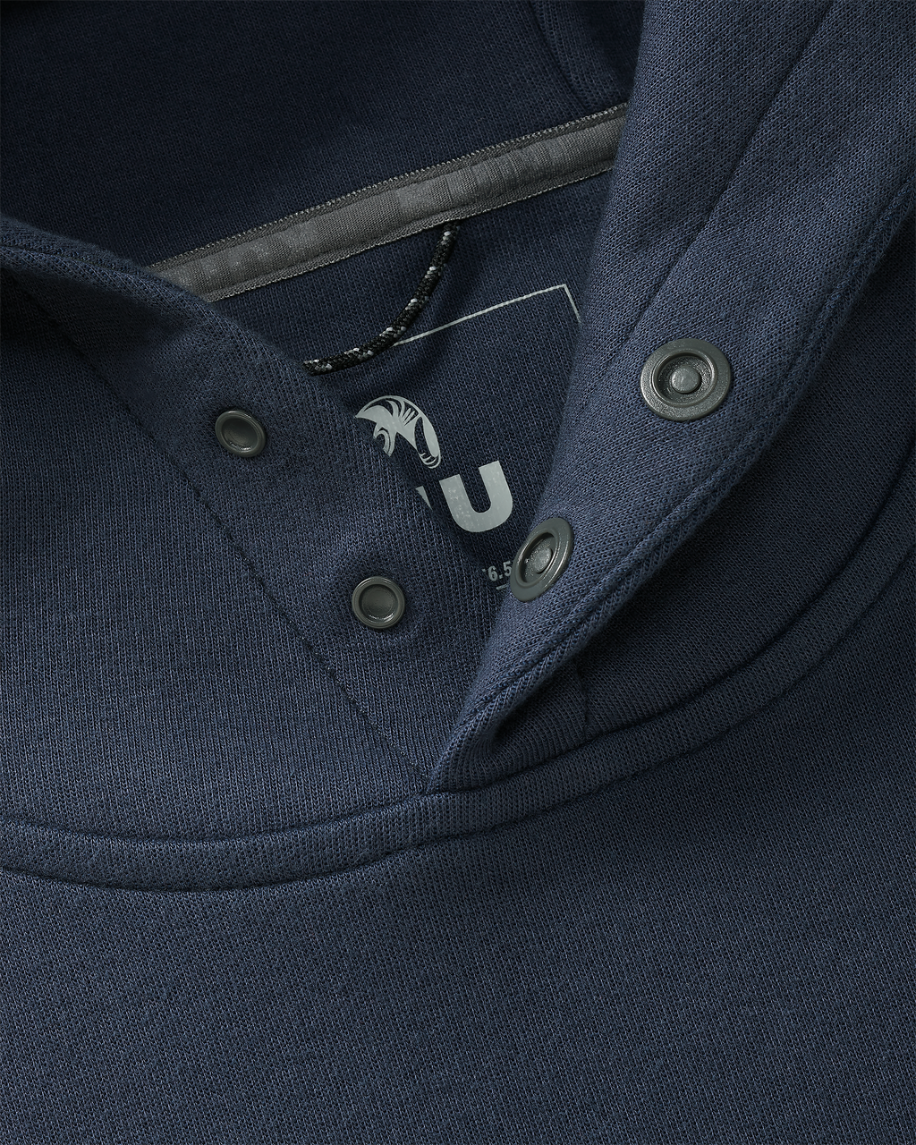 Detail of front snap-fit buttons, free of drawcords, on the Workgrade Utility Hoodie in Steel Blue
