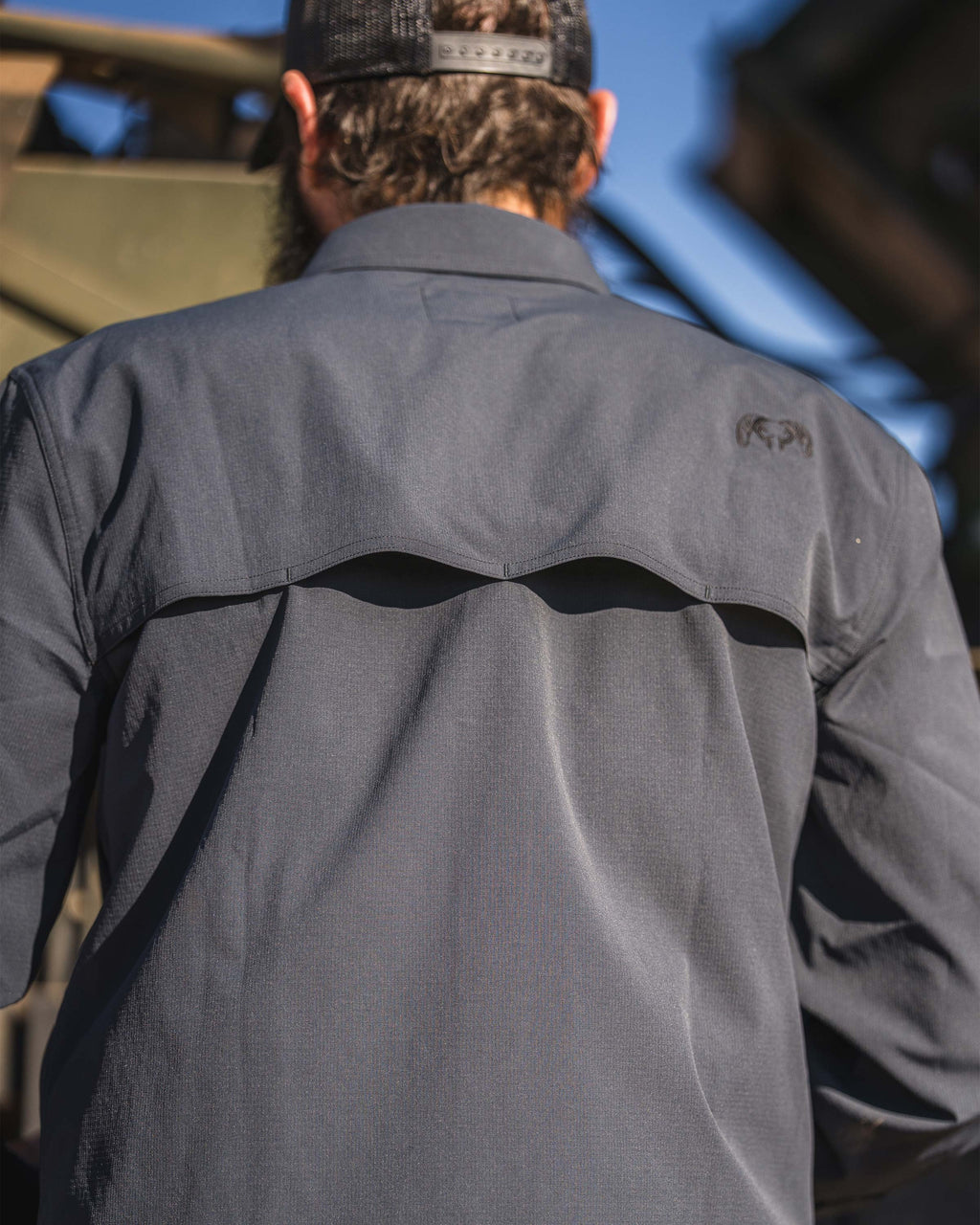 Back view of yoke venting with mesh liner for superior airflow on the Gauge Short Sleeve Work Shirt in Nightfall Blue.