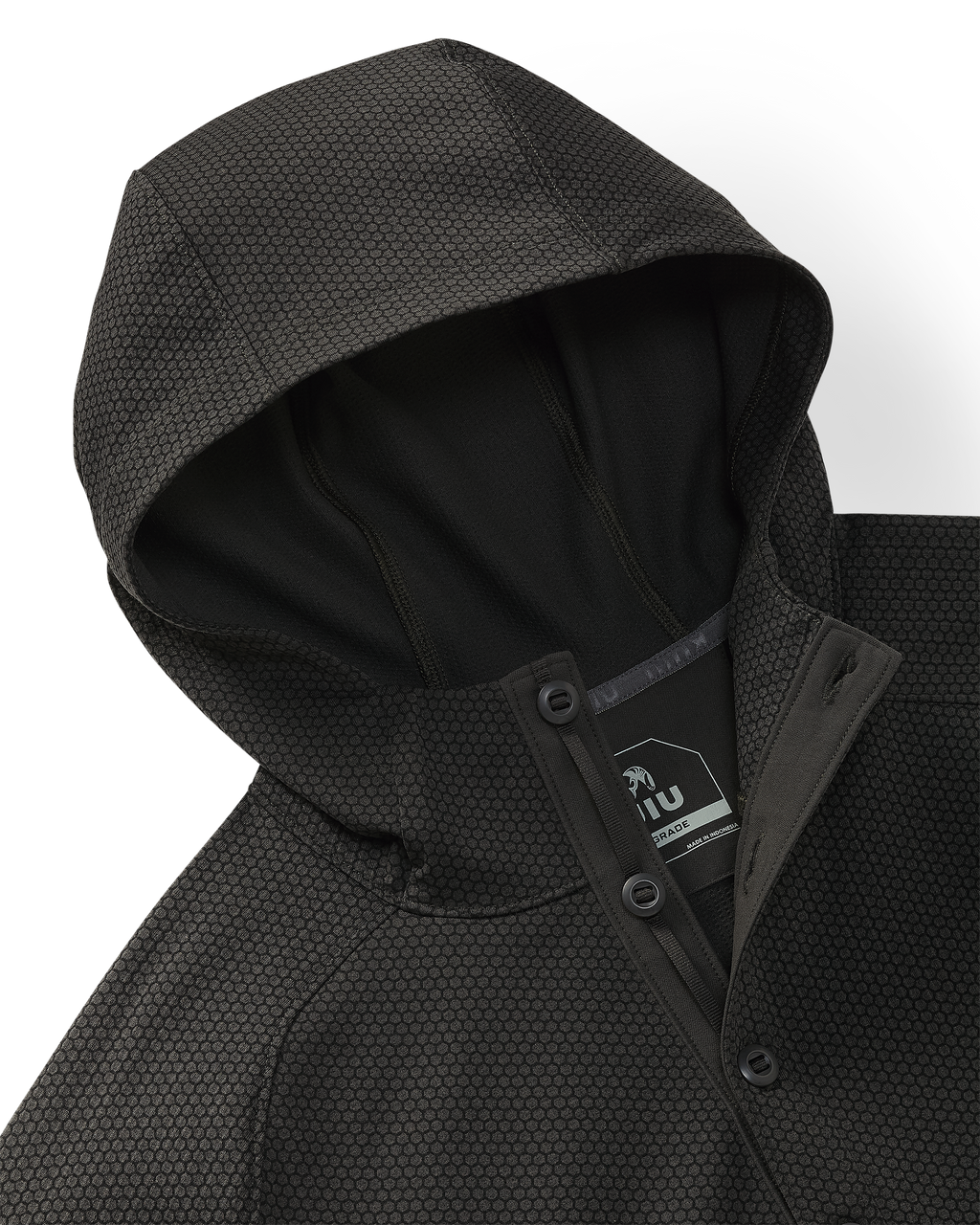 Close-up of Dura-Knit Hoodie in Asphalt Grey, highlighting hoodie, front closure buttons and honeycomb-like fabric exterior.