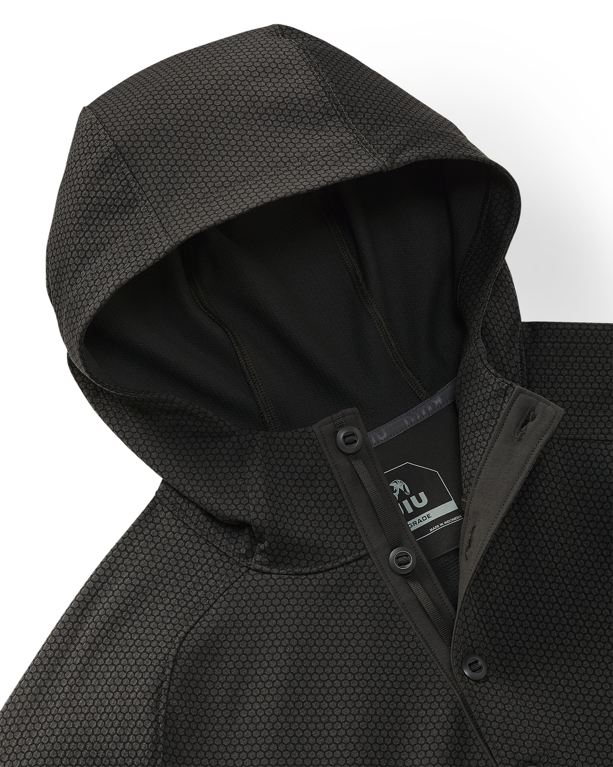Close-up of Dura-Knit Hoodie in Asphalt Grey, highlighting hoodie, front closure buttons and honeycomb-like fabric exterior.