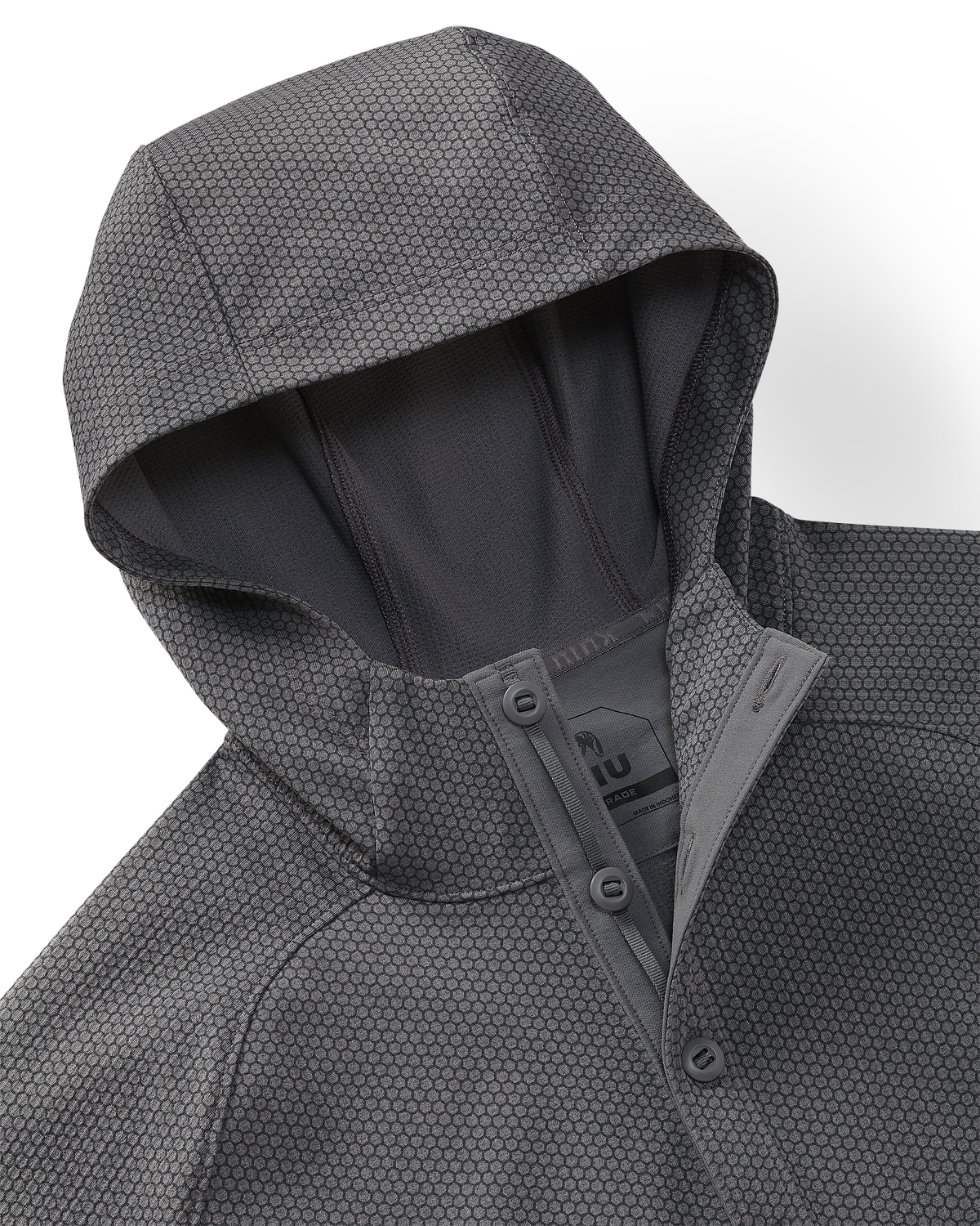 Close-up of Dura-Knit Hoodie in Castle Rock Grey, highlighting hoodie, front closure buttons and honeycomb-like fabric exterior.