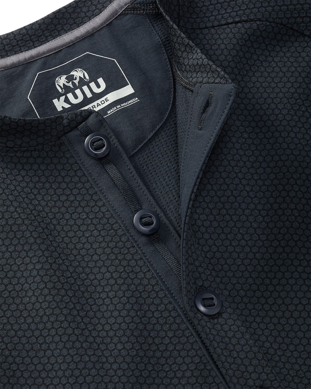 Close-up of Dura-Knit Henley in Nightfall Blue featuring slot-button placket construction with a buttoned collar and visible KUIU WORKGRADE neck label.