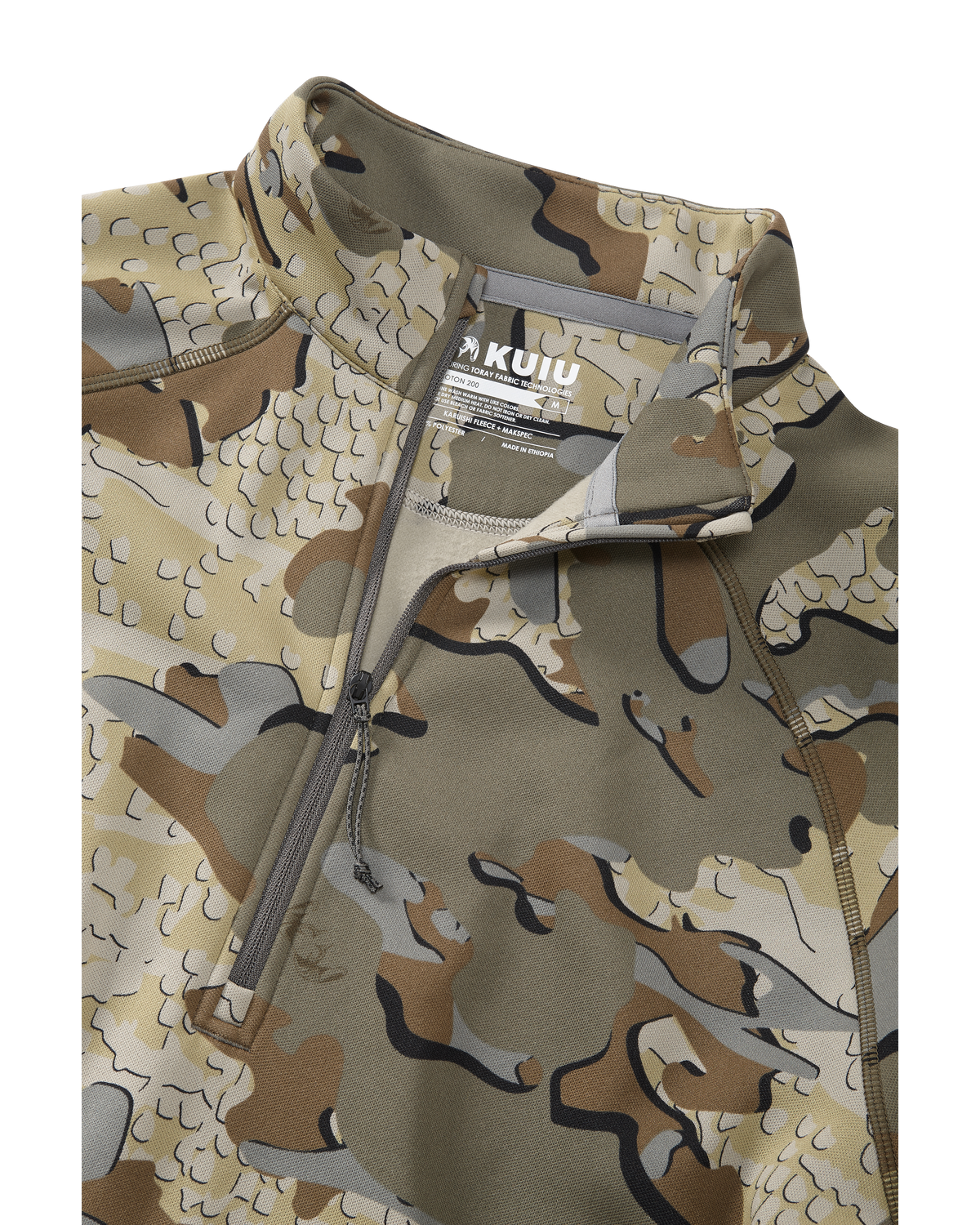 Detail of collar area with zipper partially down on Peloton 200 Zip-T in Valo Camouflage