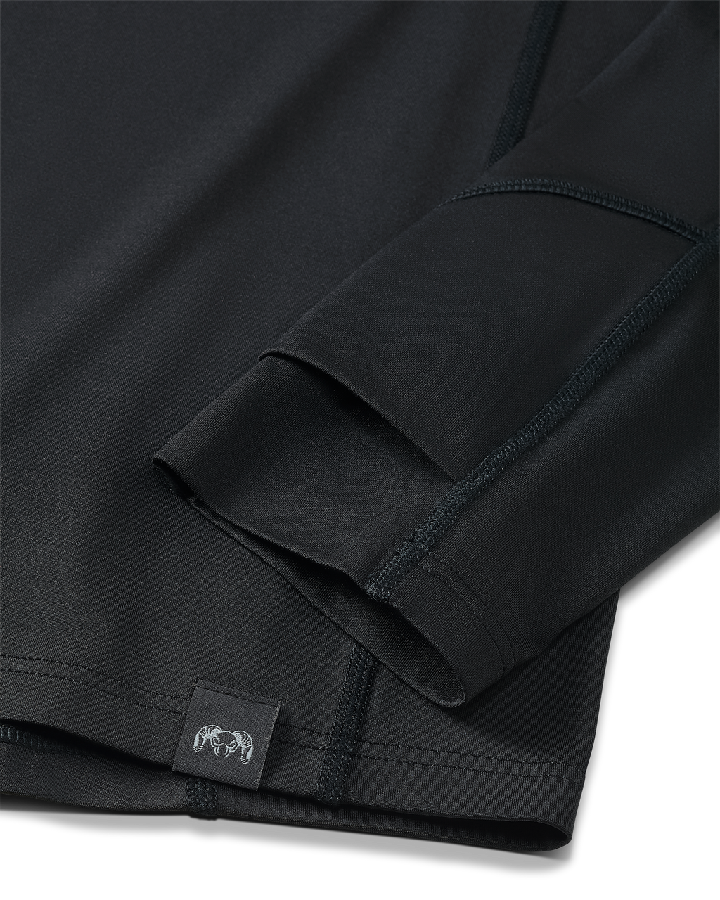 Close-up detail of layered thumbhole on Vital S2 Long Sleeve Crew in Black