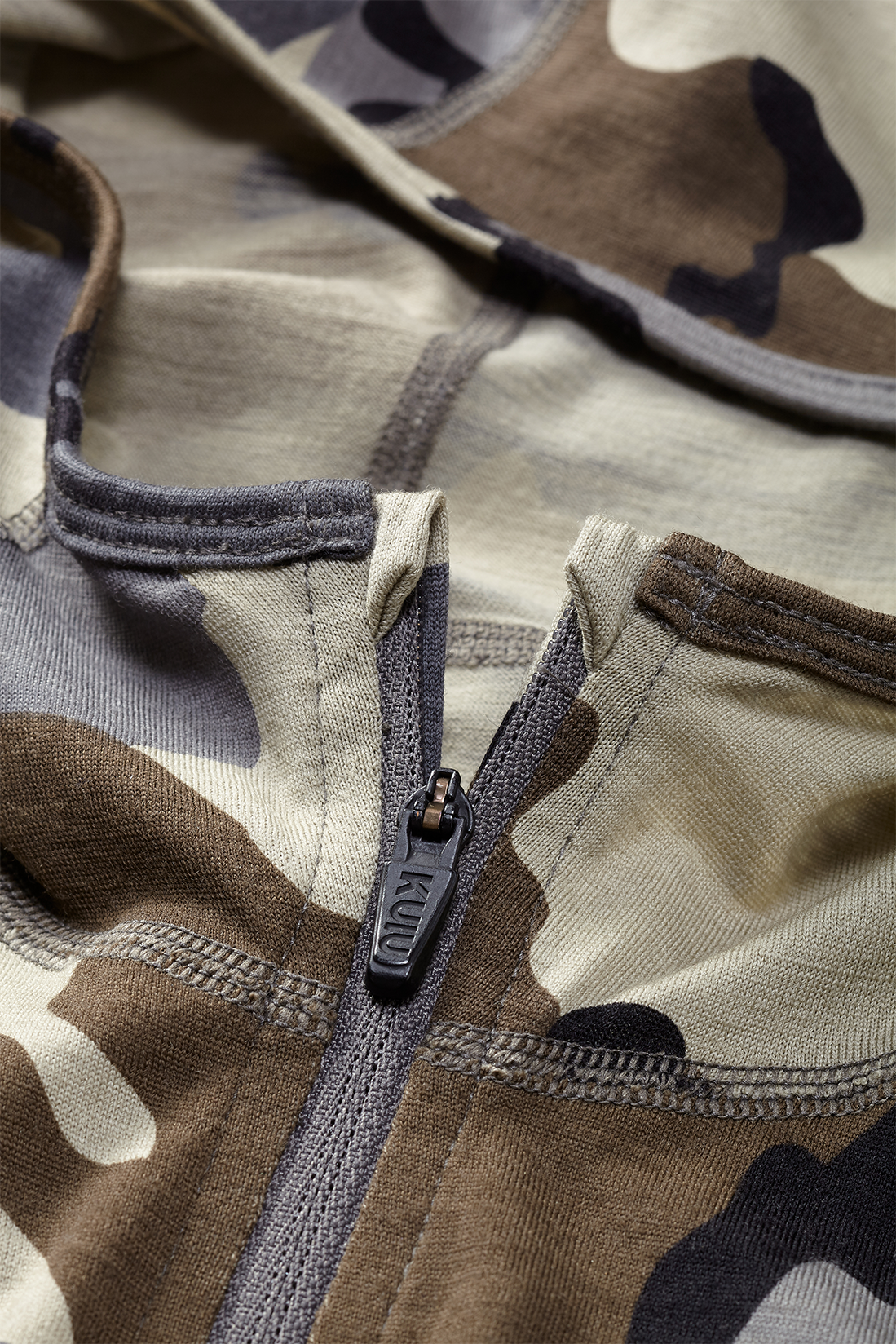 Front, Detailed View of Ultra Merino 145 Zip-T Hoodie in Vias Camouflage Highlighting Zipper Chin Guard