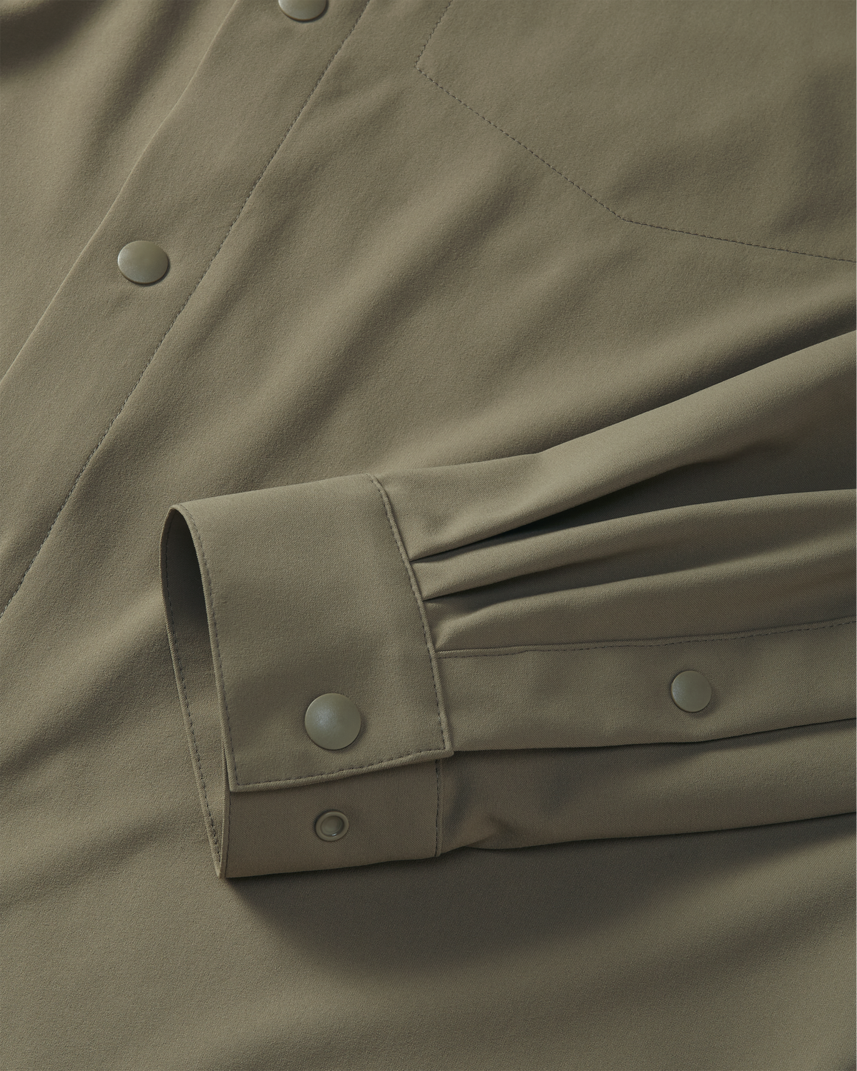 Front of Mesa Vented Long Sleeve Snap Shirt in Khaki Color Highlighting Snap Cuff Closure
