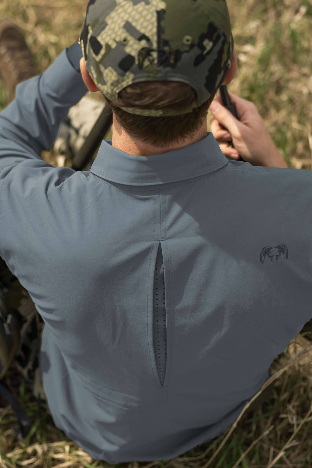 Open back vent of the Mesa Long Sleeve Snap Shirt in Slate Blueish Grey
