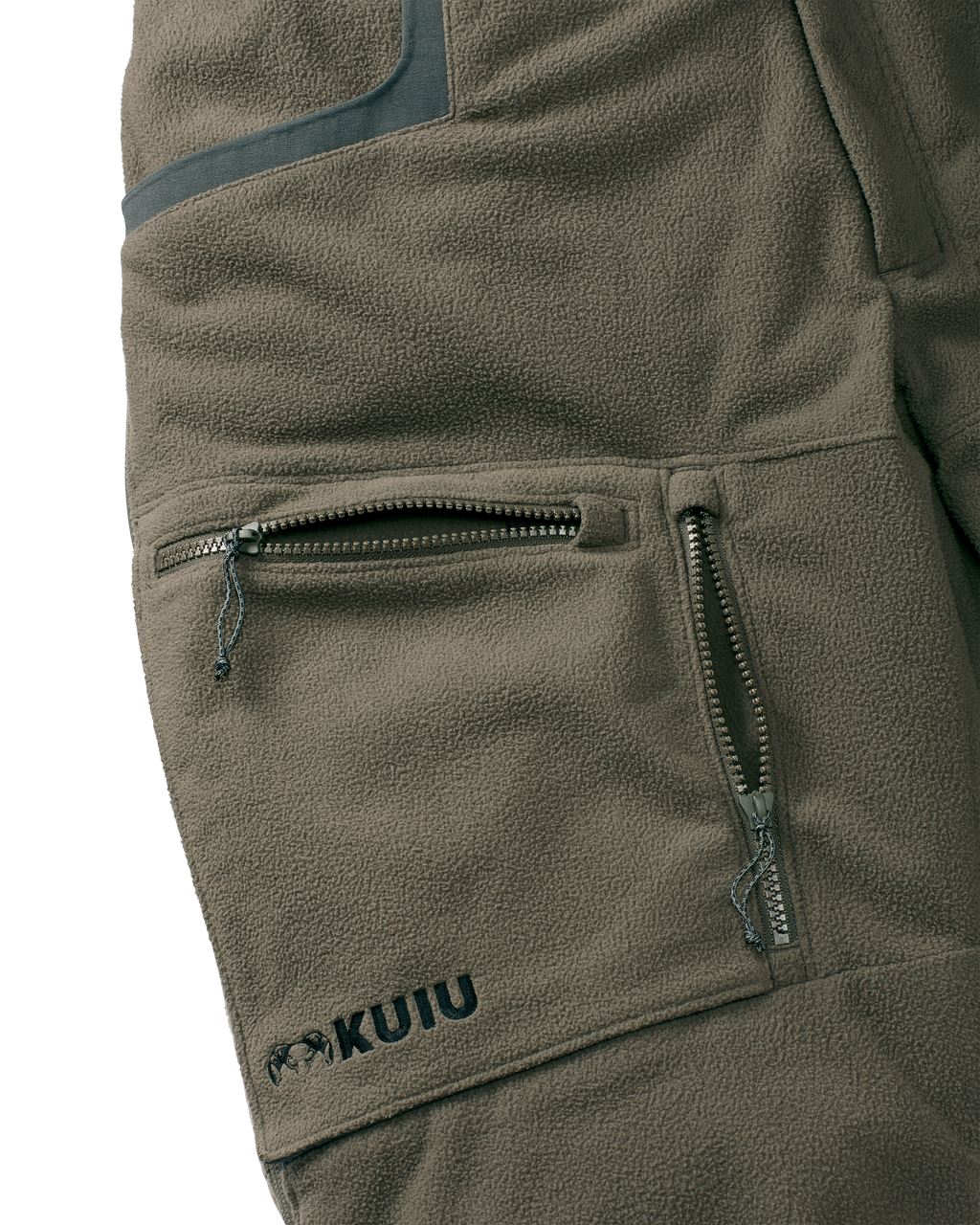 Close-up view of front zippered dual-compartment cargo pockets on the Proximity Insulated Pant in Ash Brown