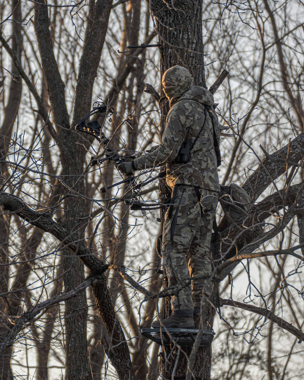 Side of Hunter Standing in Treestand Wearing Proximity Insulated Pants in Valo Camouflage