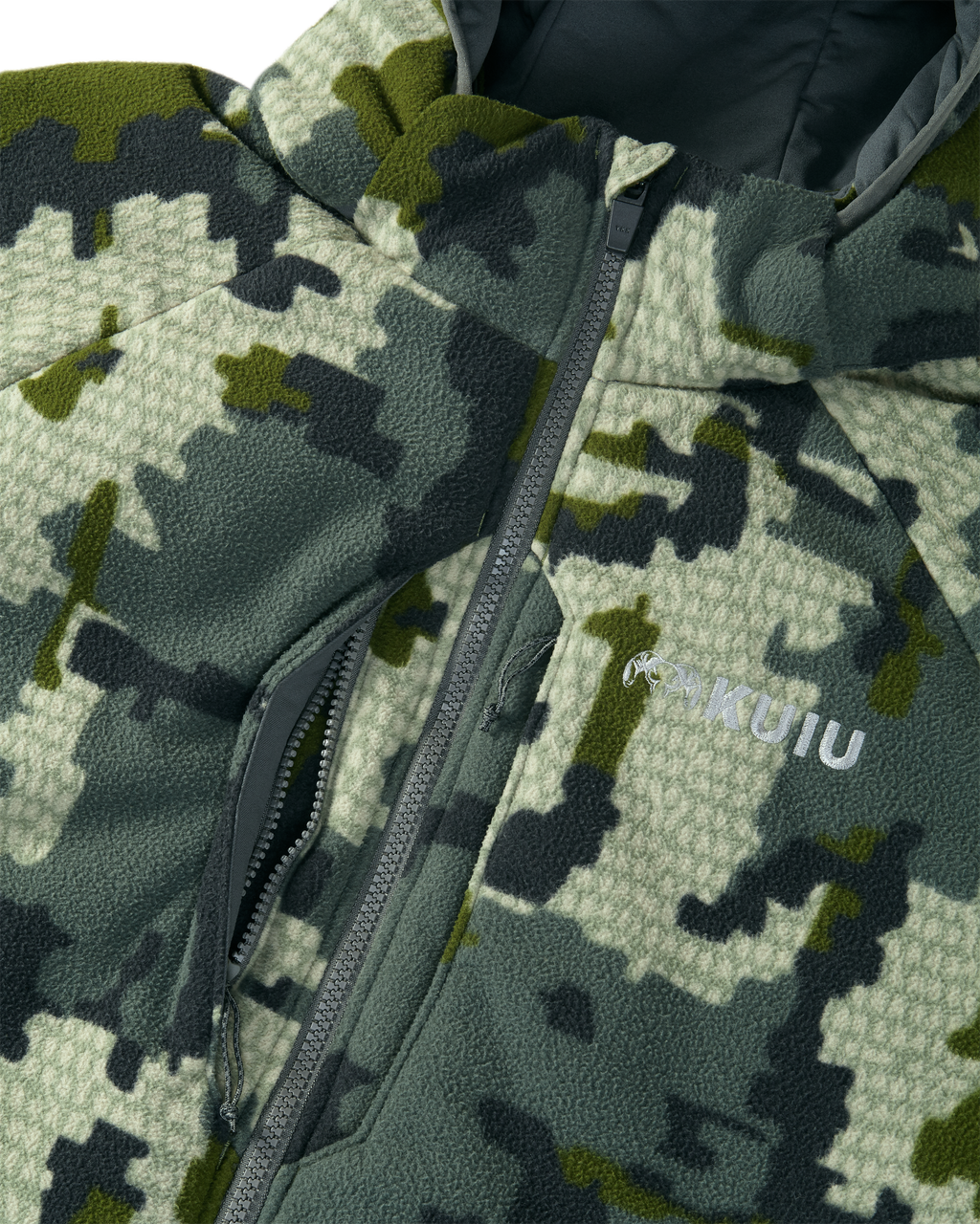 Close-up of front vertical zippered chest pockets with interior accessory loops on the Proximity Hooded Insulated Jacket in Verde Camouflage
