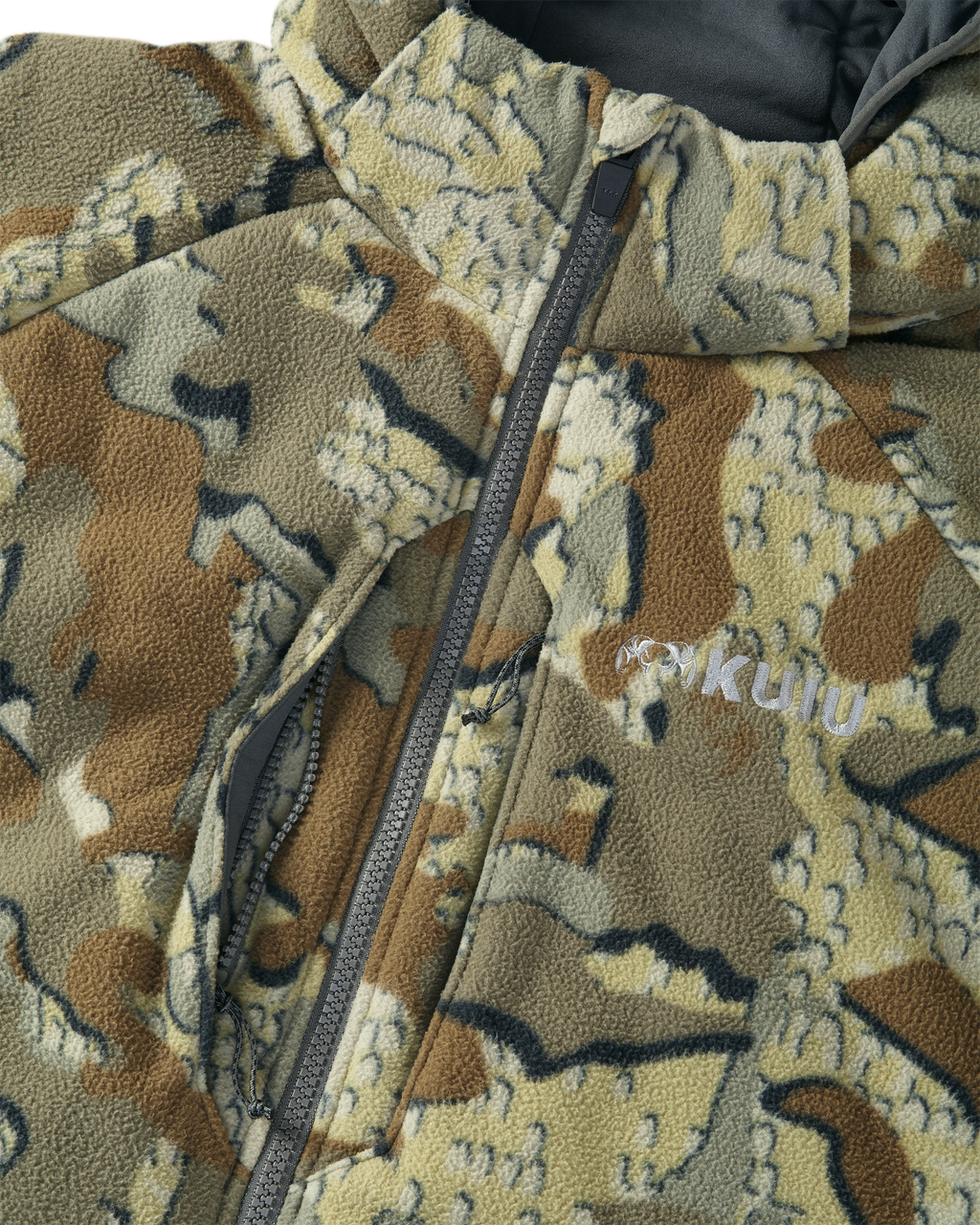 Close-up of front vertical zippered chest pockets with interior accessory loops on the Proximity Hooded Insulated Jacket in Valo Camouflage