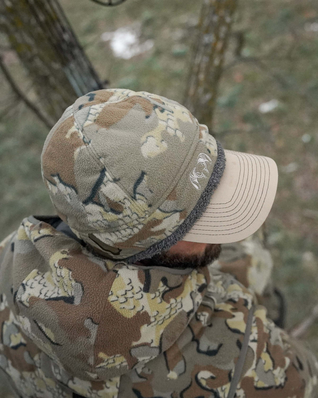Top view close up of hunter wearing Proximity Beanie in Valo Camouflage over hat