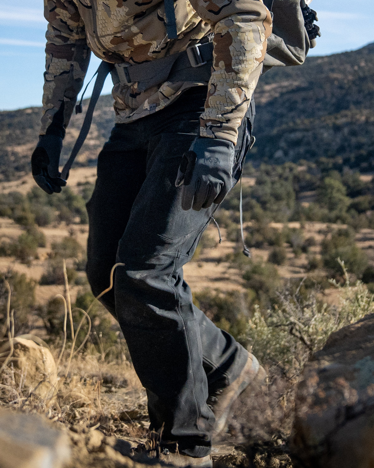 Side of Hunter Wearing Attack Pants in Black Color