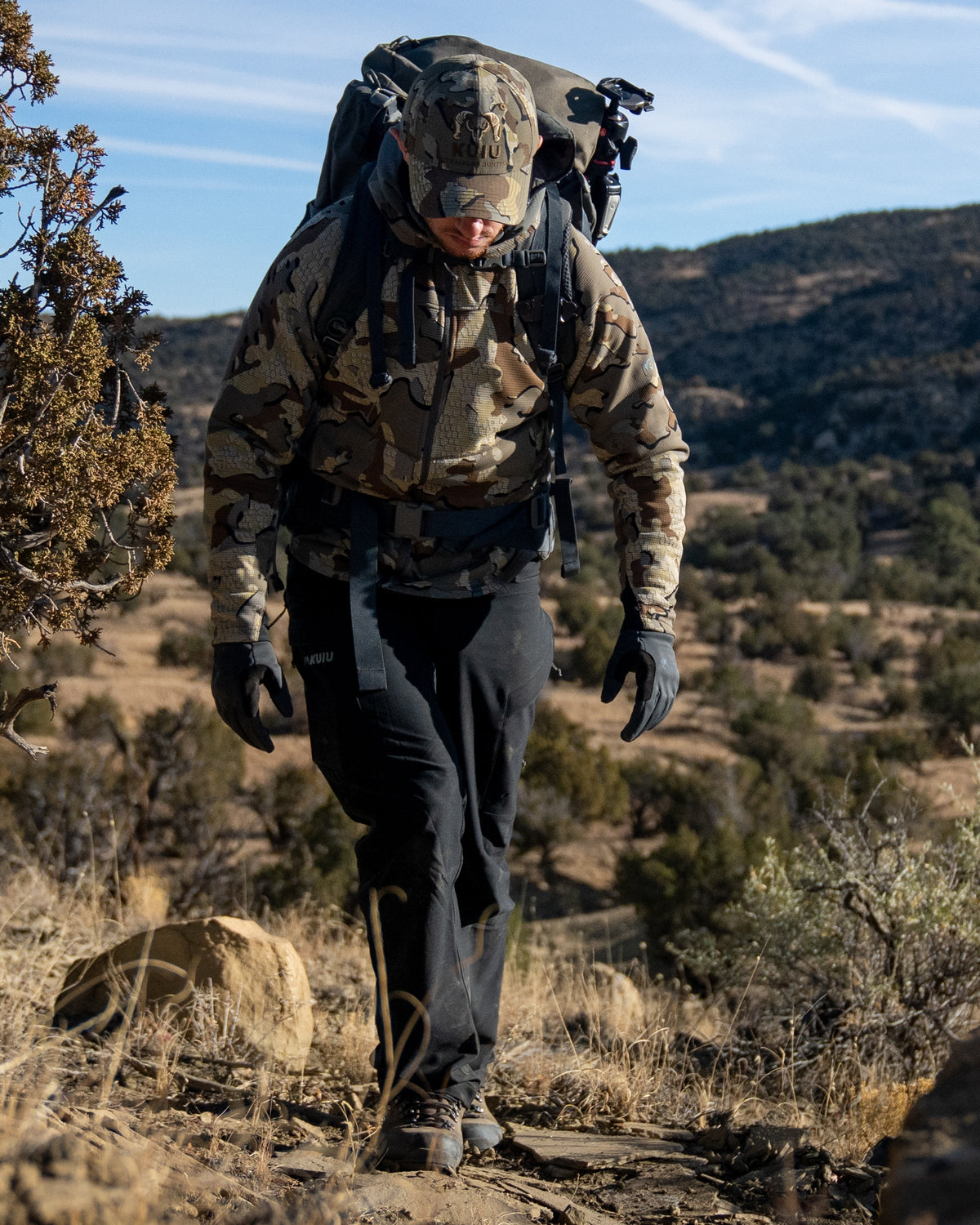 Front of Hunter Hiking Wearing Attack Pants in Black Color