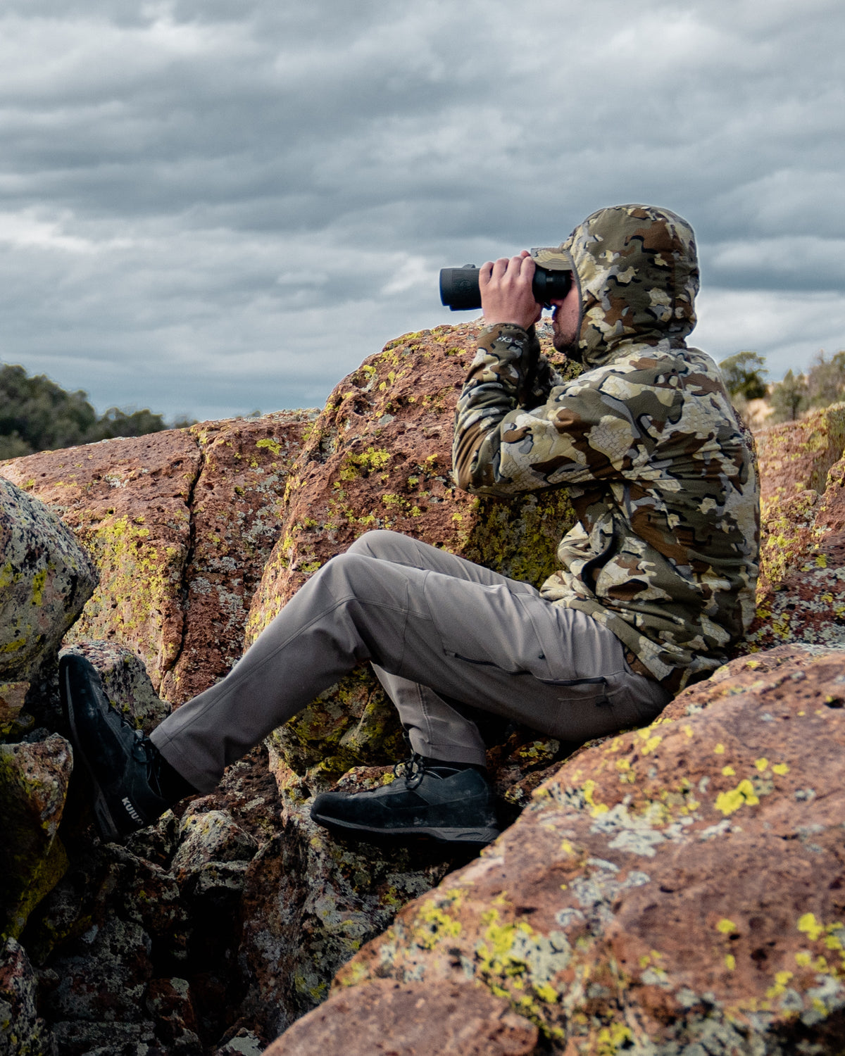 Side of Hunter Glassing Game Wearing Attack Pants in Khaki Color