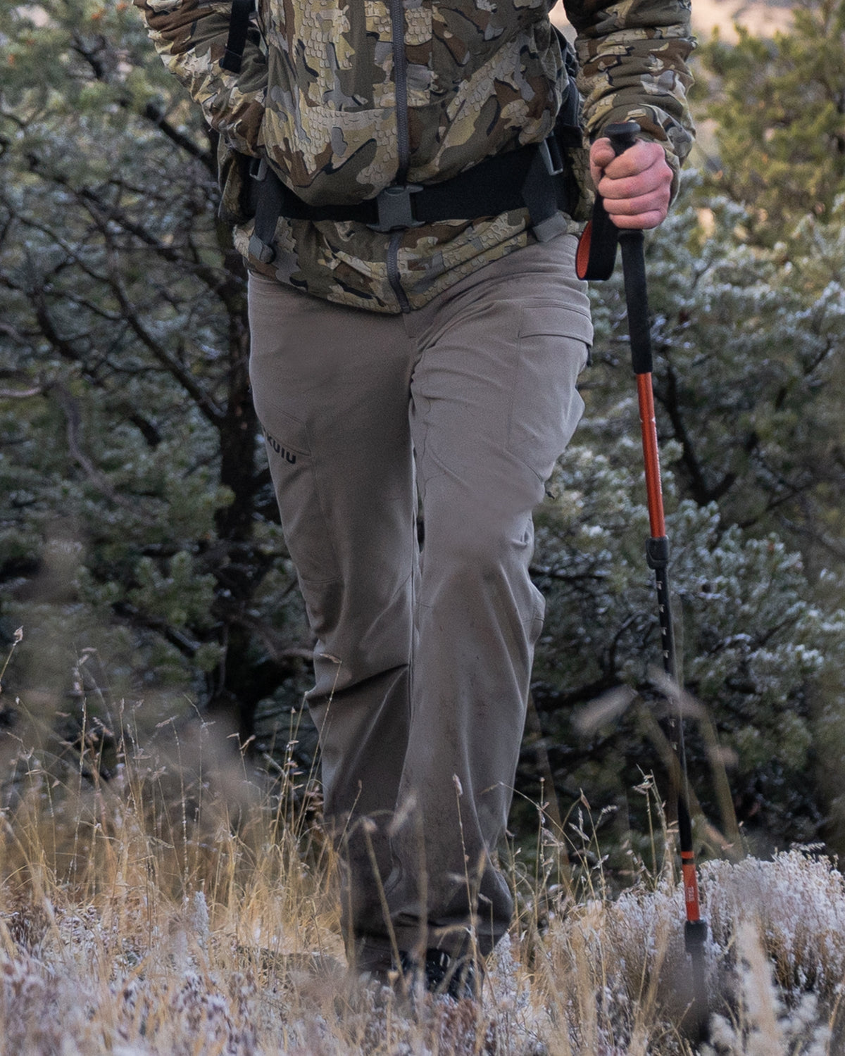 Front of Hunter Hiking Wearing Attack Pants in Khaki Color