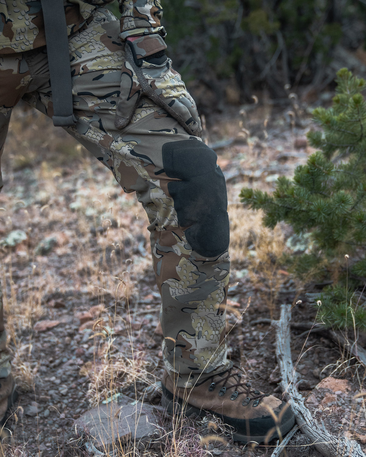 Angled, Front View of Talus Hybrid Pants in Valo Camouflage Highlighting Ultra-Suede, Foam-Lined Knee Pad
