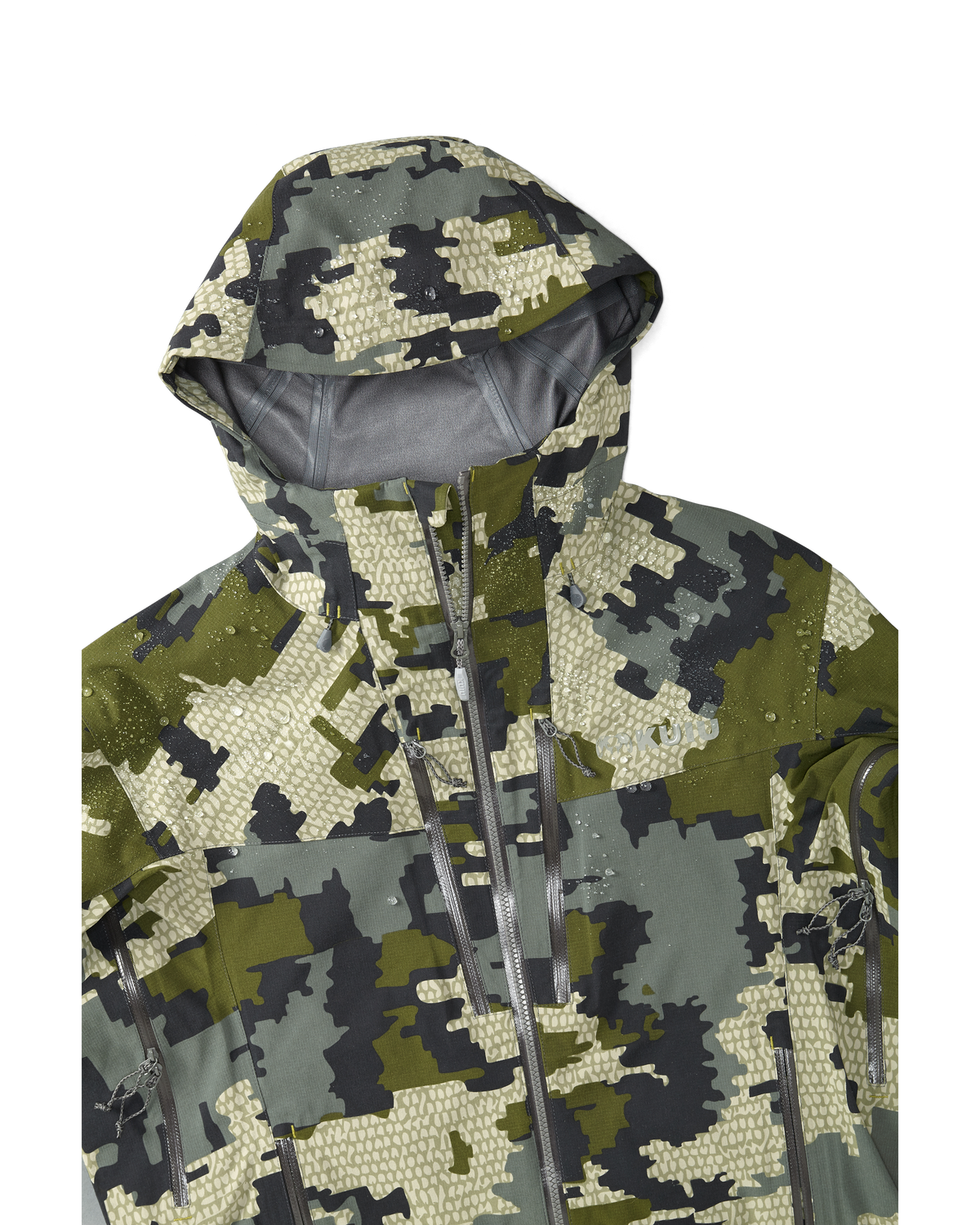Kutana Storm Shell Jacket in Verde Camouflage Color showcasing water dropletts and chest pocketing