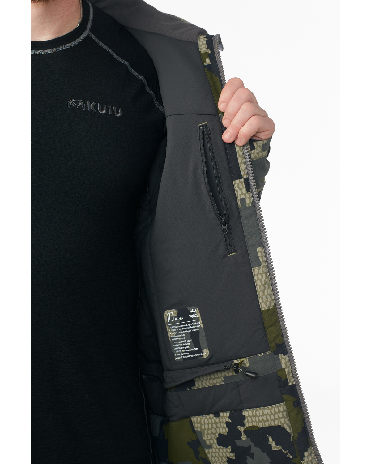 Inside panel of the Kutana Gale Force Hooded Jacket in Verde Camouflage with inside zipper open