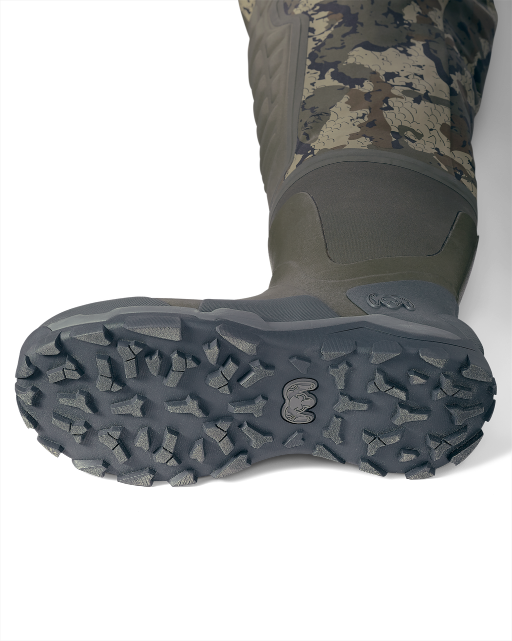 Bottom of KUIU PRO HD Flex Zip Wader Boots in Veros camouflage Highlighting the Self-cleaning Soles