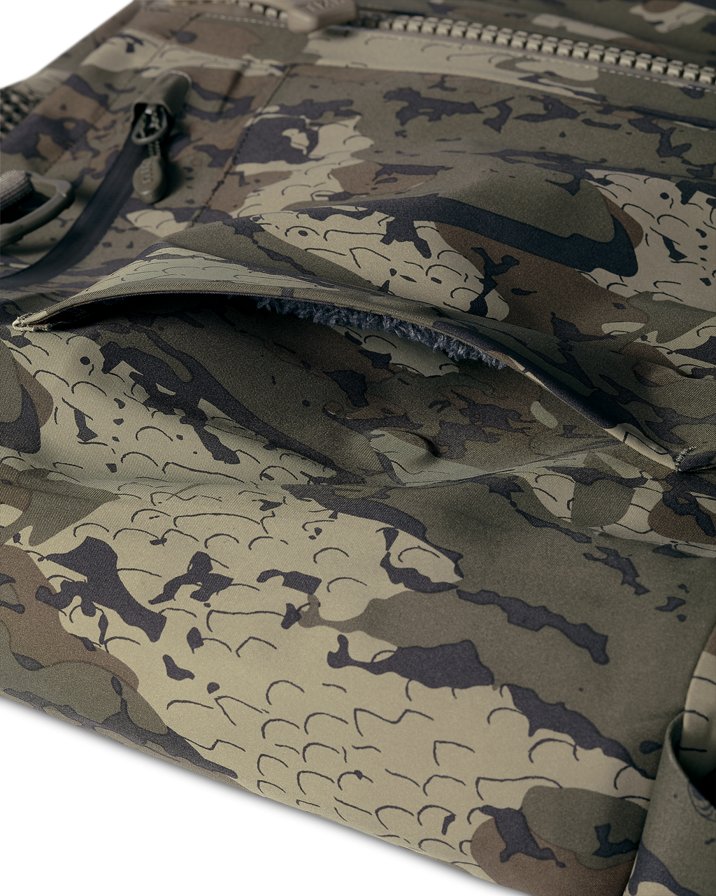 Side paneling and Sherpa fleece-lined hand pockets on the KUIU PRO HD Flex Zip Wader in Veros Camouflage
