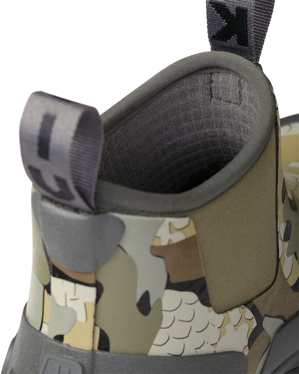 Close-up of pull-on loops and highlighting the grid fleece liner on the KUIU Ankle Mud Boot in Valo Camouflage
