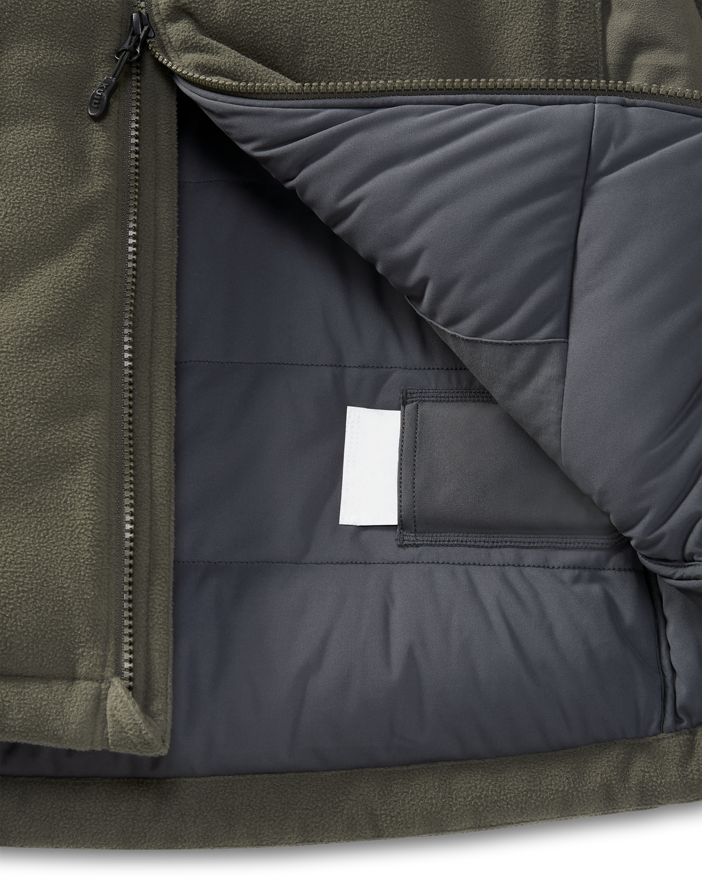 Internal heat pack pockets on the Super Down Haven Hooded Jacket in Ash Brown