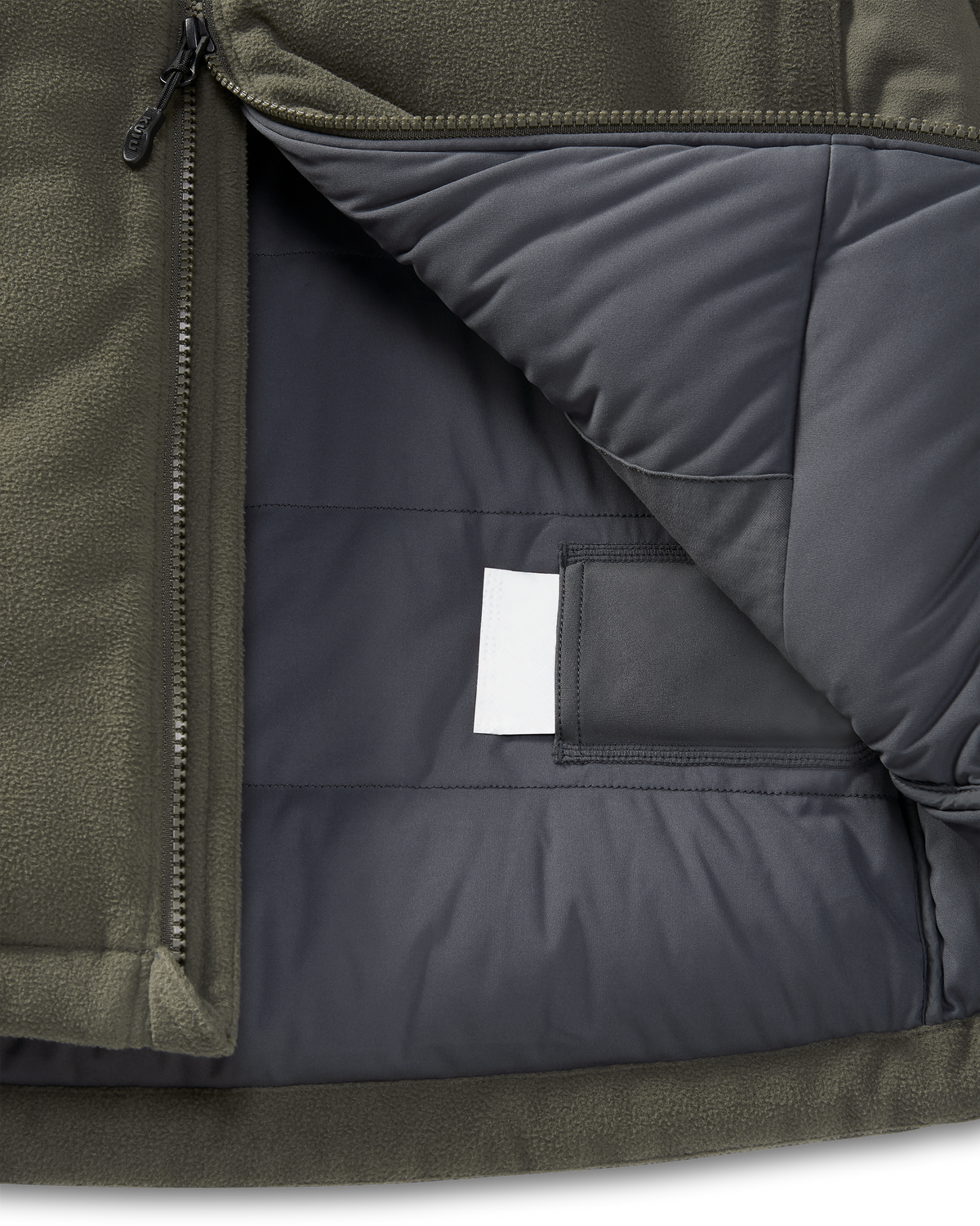 Internal heat pack pockets on the Super Down Haven Hooded Jacket in Ash Brown