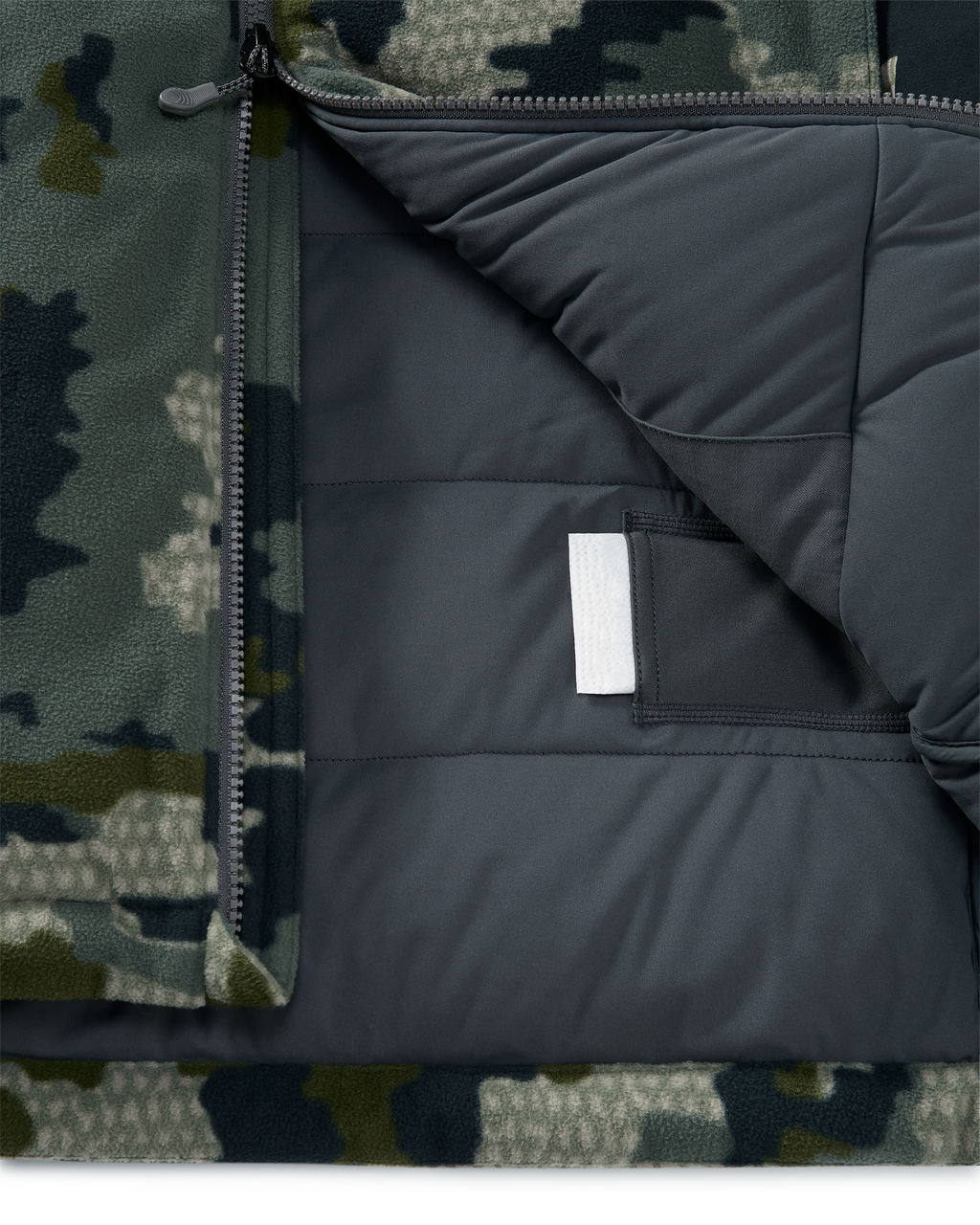 Internal heat pack pockets on the Super Down Haven Hooded Jacket in Verde Camouflage