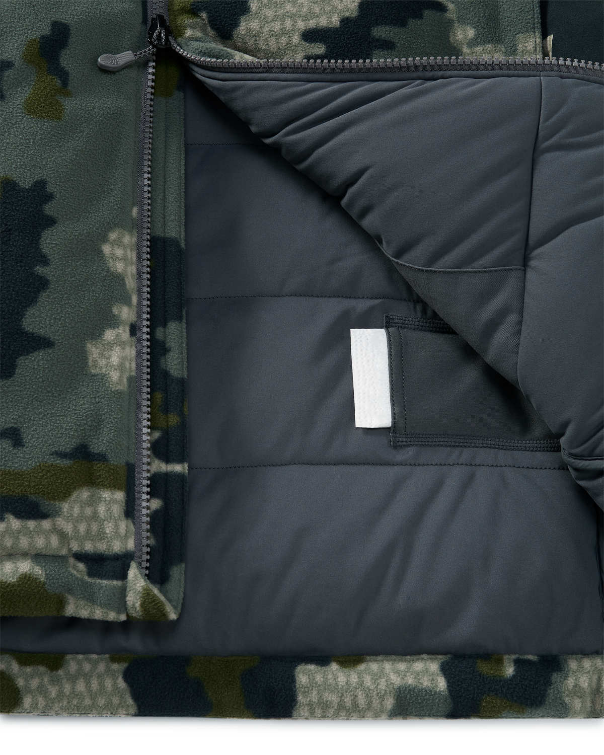 Internal heat pack pockets on the Super Down Haven Hooded Jacket in Verde Camouflage