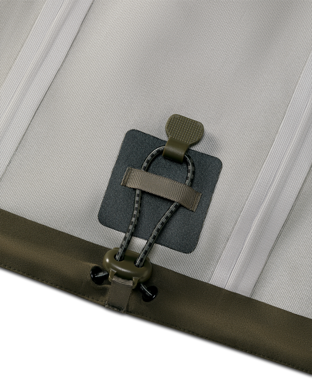 Close-up of adjustable hem cinch with cord keeper